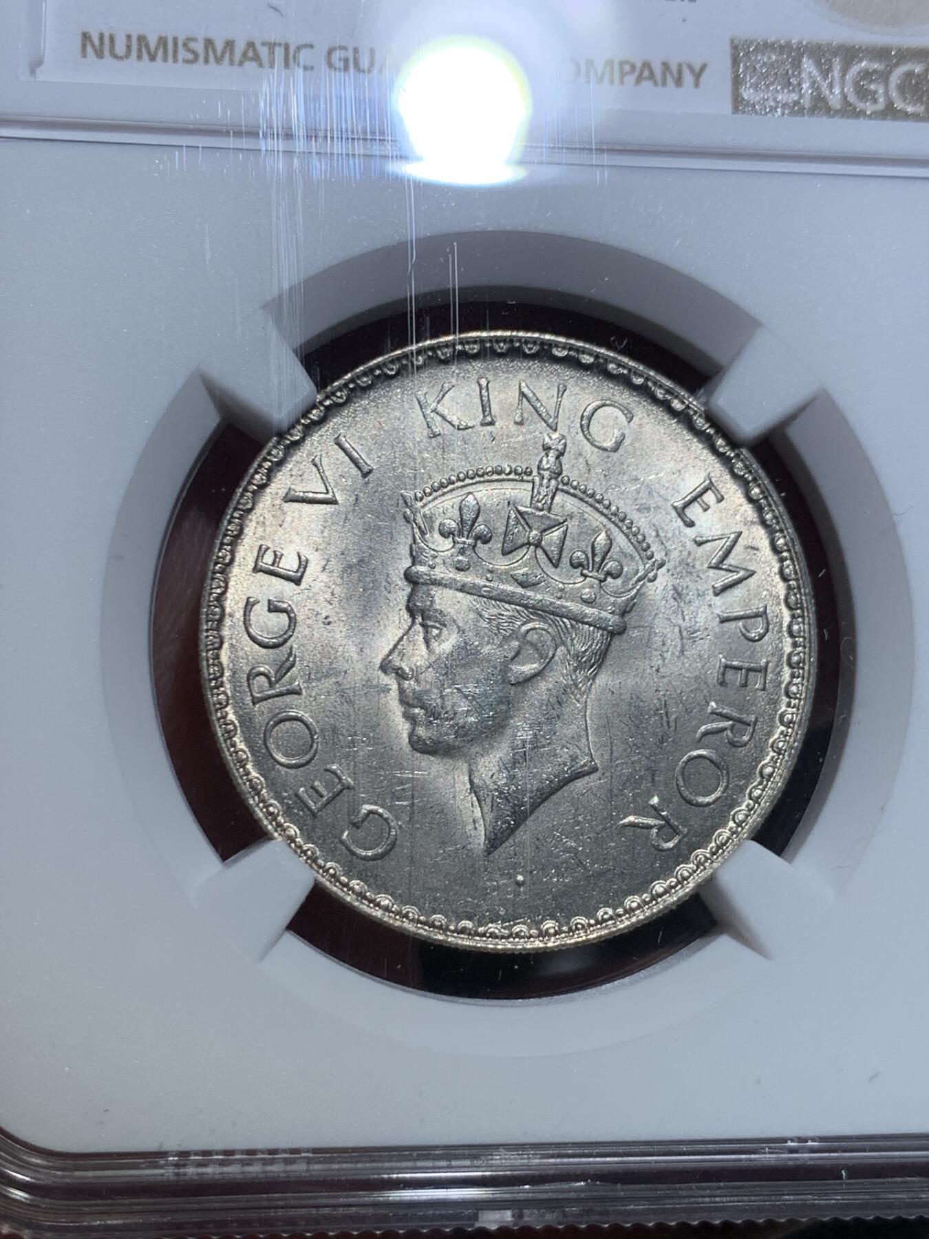 《竞宝斋》第328场 周日，周一，周二 3场连拍 （全场包邮） NGC MS62 英属印度1941年1卢比银币B版 乔治六世 原光卷拆转光品相 早期窄边