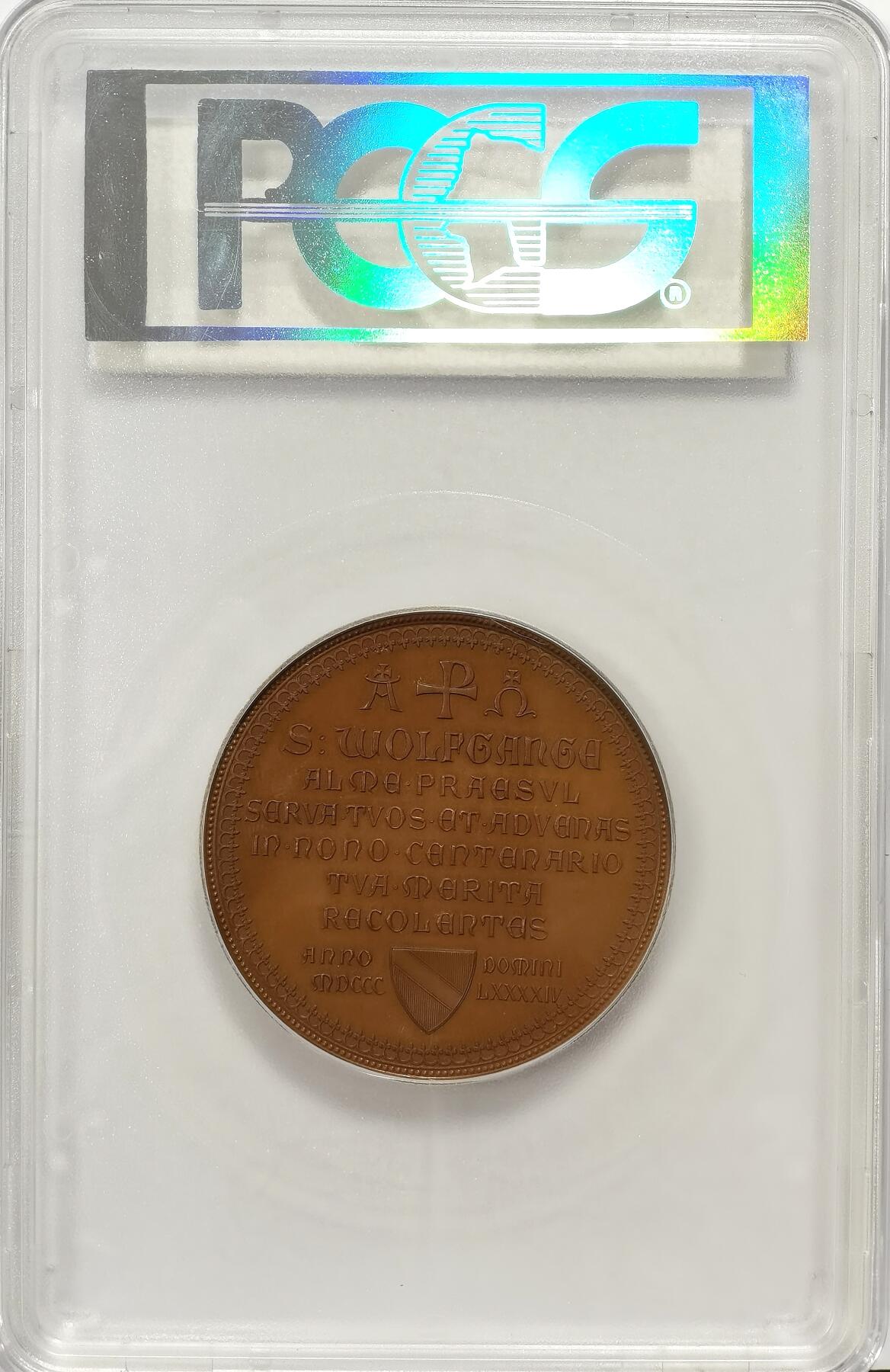 博洋堂“瑰宝之夜”第100期盛典专场（全场顺丰包邮） PCGS SP66 1894年雷根斯堡教区纪念圣沃尔夫冈逝世900周年大型铜章，乔治·登格勒设计；阿洛伊斯·伯尔施雕刻。本章正面为圣沃尔夫冈端坐像，前方有两个天使手执披风。背面有9行文字环绕教堂和城市徽章。直径51.8毫米，热门题材，超大尺寸，雕刻极其精美。19世纪的铜章能达到66分寥若晨星，德章精品之作，值得藏家入手