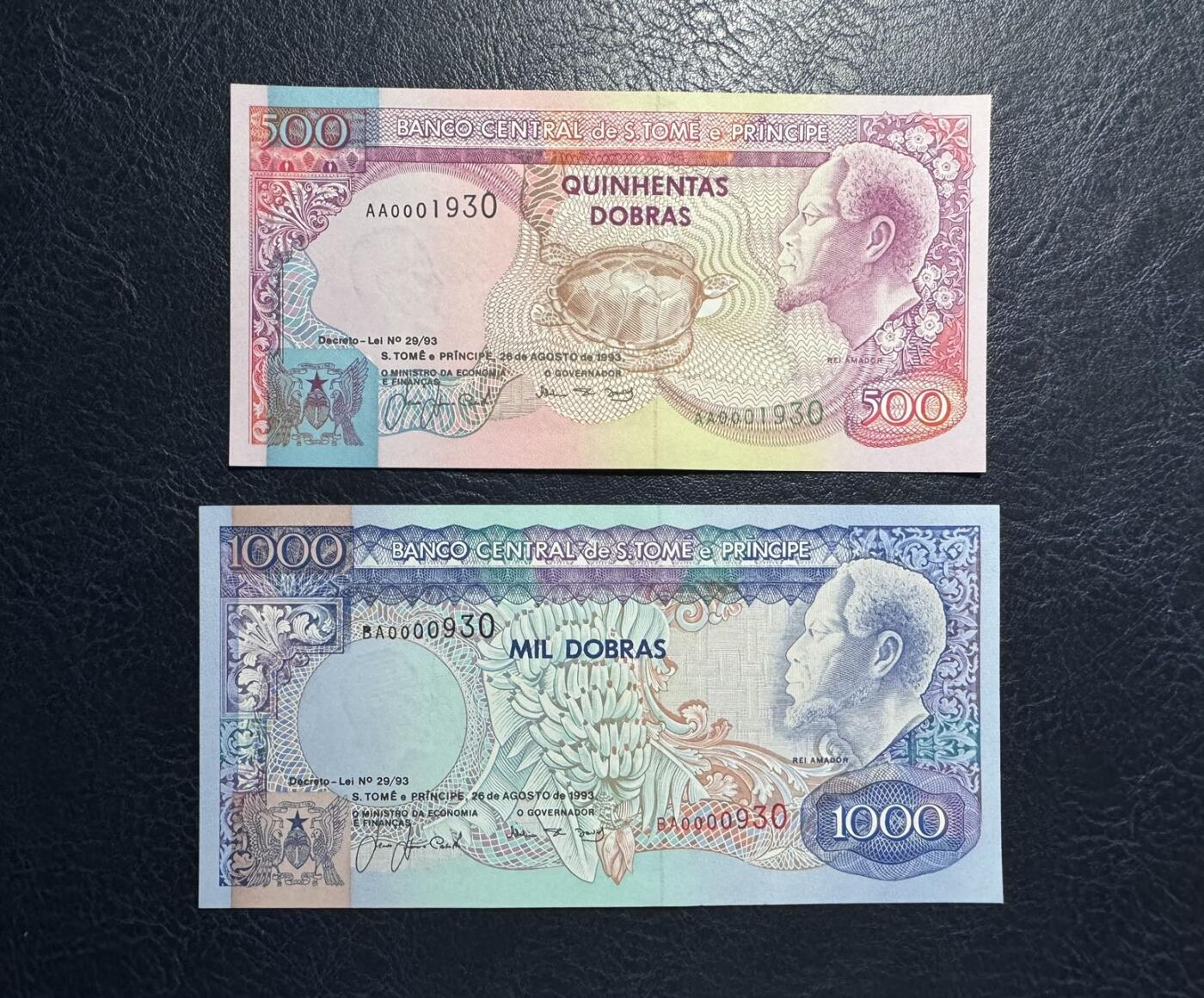 收藏联盟Quantum Auction 第393期拍卖  圣多美和普林西比1993年500和1000元首发冠尾三同及1989年1000元 品相全新UNC