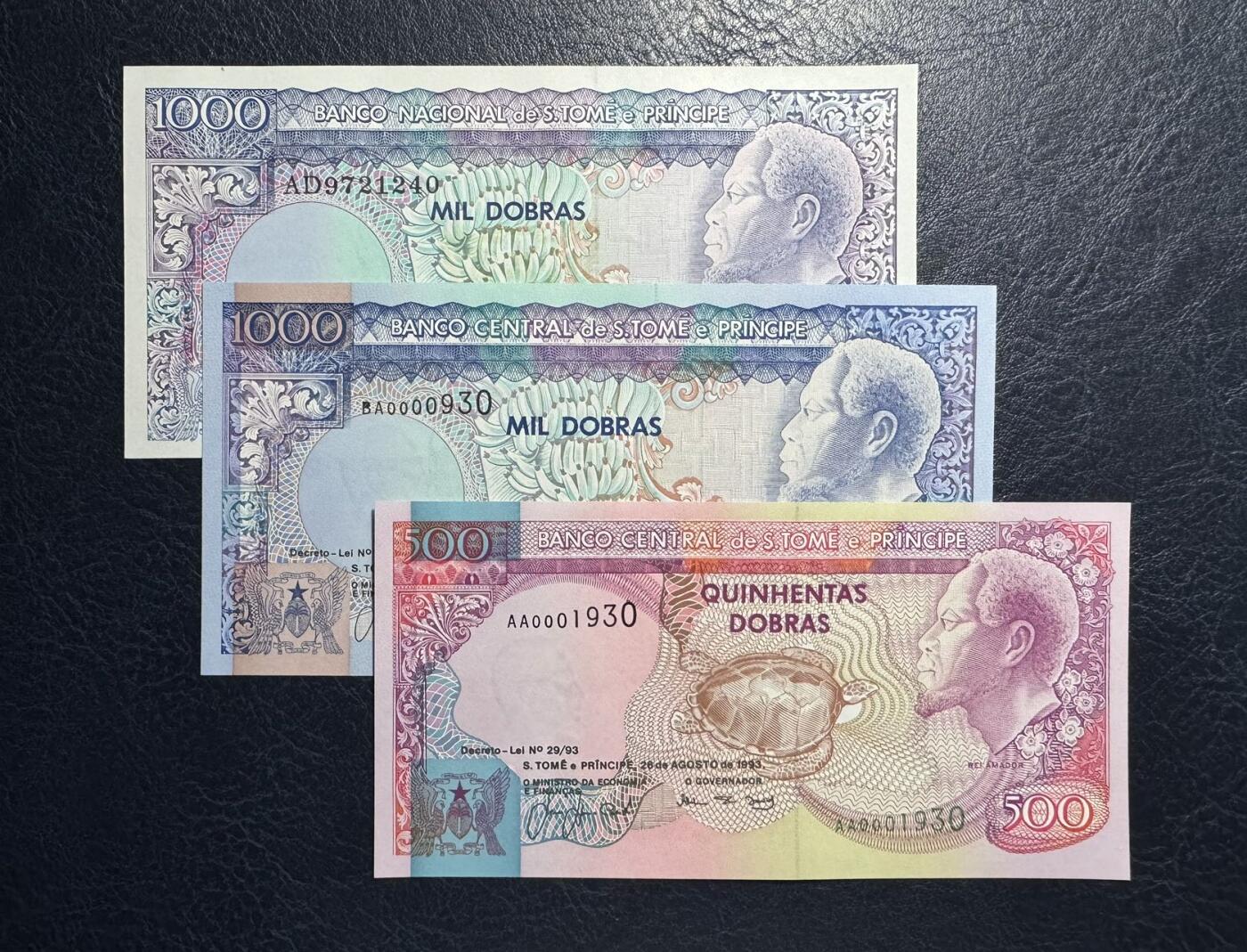 收藏联盟Quantum Auction 第393期拍卖  圣多美和普林西比1993年500和1000元首发冠尾三同及1989年1000元 品相全新UNC