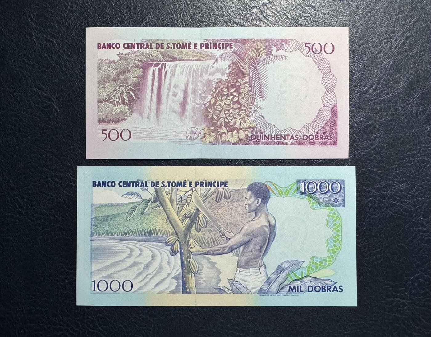 收藏联盟Quantum Auction 第393期拍卖  圣多美和普林西比1993年500和1000元首发冠尾三同及1989年1000元 品相全新UNC