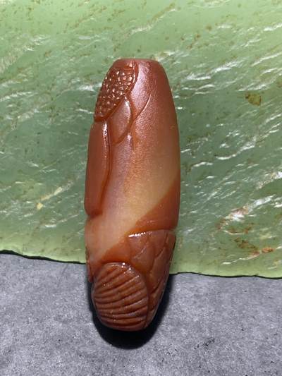 精美亚光冻料战国红玛瑙手工俏色巧雕红龙鱼桶珠一个 精美亚光冻料战国红玛瑙手工俏色巧雕红龙鱼桶珠一个