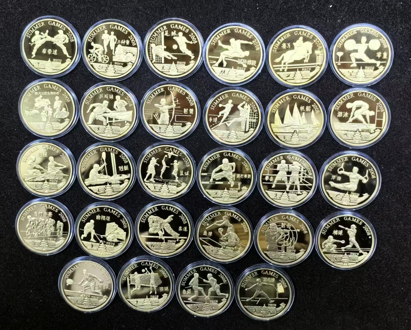 朝鲜纪念北京奥运会28个体育项目28枚铜币大全套，公司清账甩货，原价一千左右的套币，现在550元团购，数量有限，欲购从速，全场包邮，品相基本如图，随机发放，极个别有轻微氧化 朝鲜纪念北京奥运会28个体育项目28枚铜币大全套，公司清账甩货，原价一千左右的套币，现在550元团购，数量有限，欲购从速，全场包邮，品相基本如图，随机发放，极个别有轻微氧化