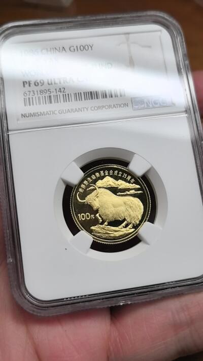 凡希社世界钱币微拍第二百九十一期 1986中国野牦牛100元金币NGC-PF69UC，11.318g，917金，铸量3000枚。(视频参考)