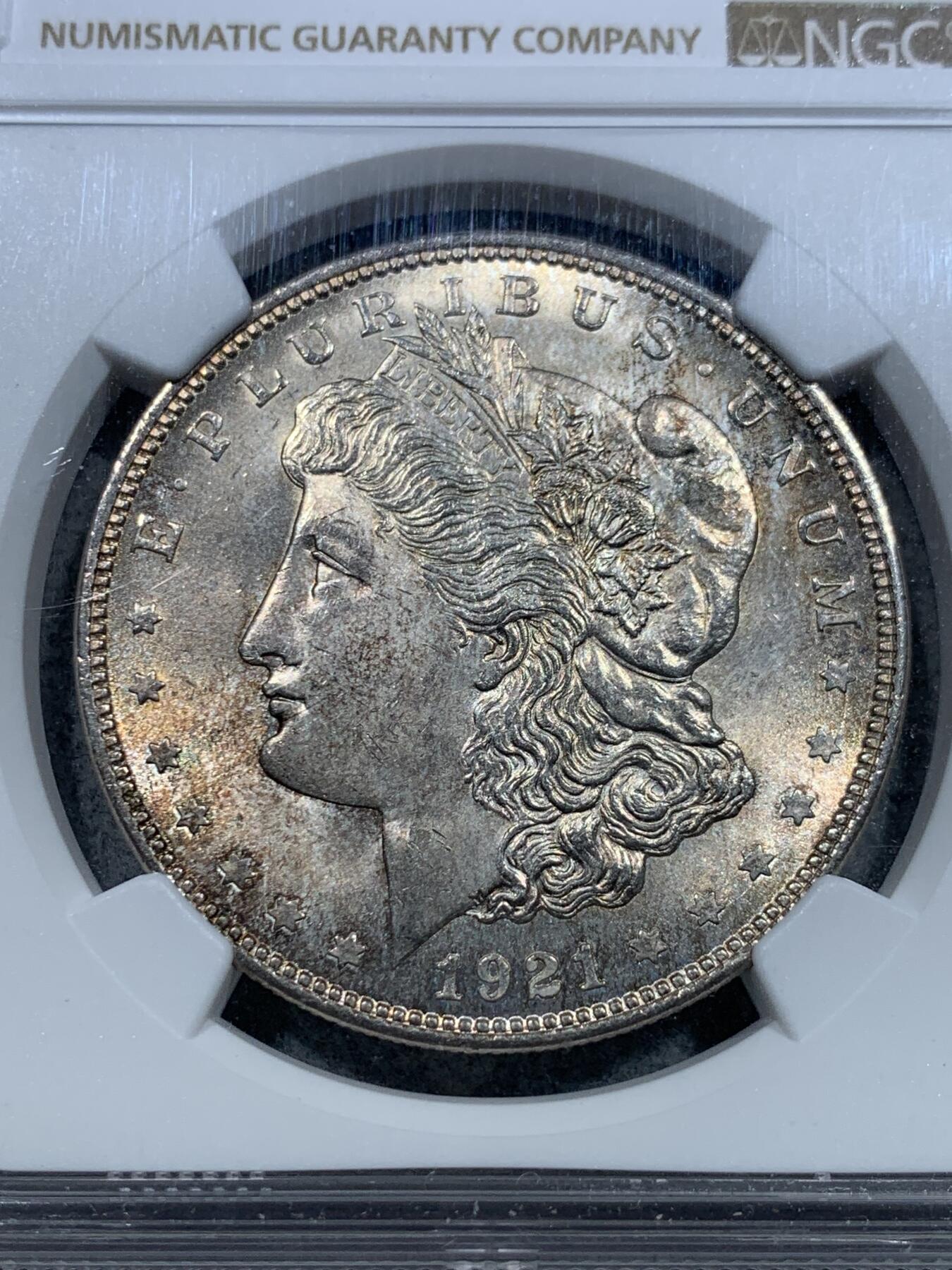 《竞宝斋》第331场 周日，周一 2场连拍 （全场包邮） NGC MS65 美国1921年摩根银币，漂亮包浆，光度很好。