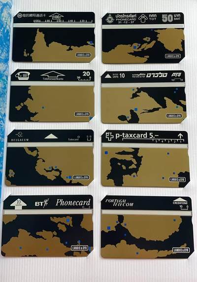 《卡拍》第314期拍卖12月1日晚22：10时延时截拍 比利时、英国、葡萄牙、瑞士、以色列、奥地利、泰国、中国台湾等八个国家地区联合发行《祝贺兰吉尔公司光学电话卡生产5亿枚》八全新卡带册，未流通品相。珍罕，有底价起拍。