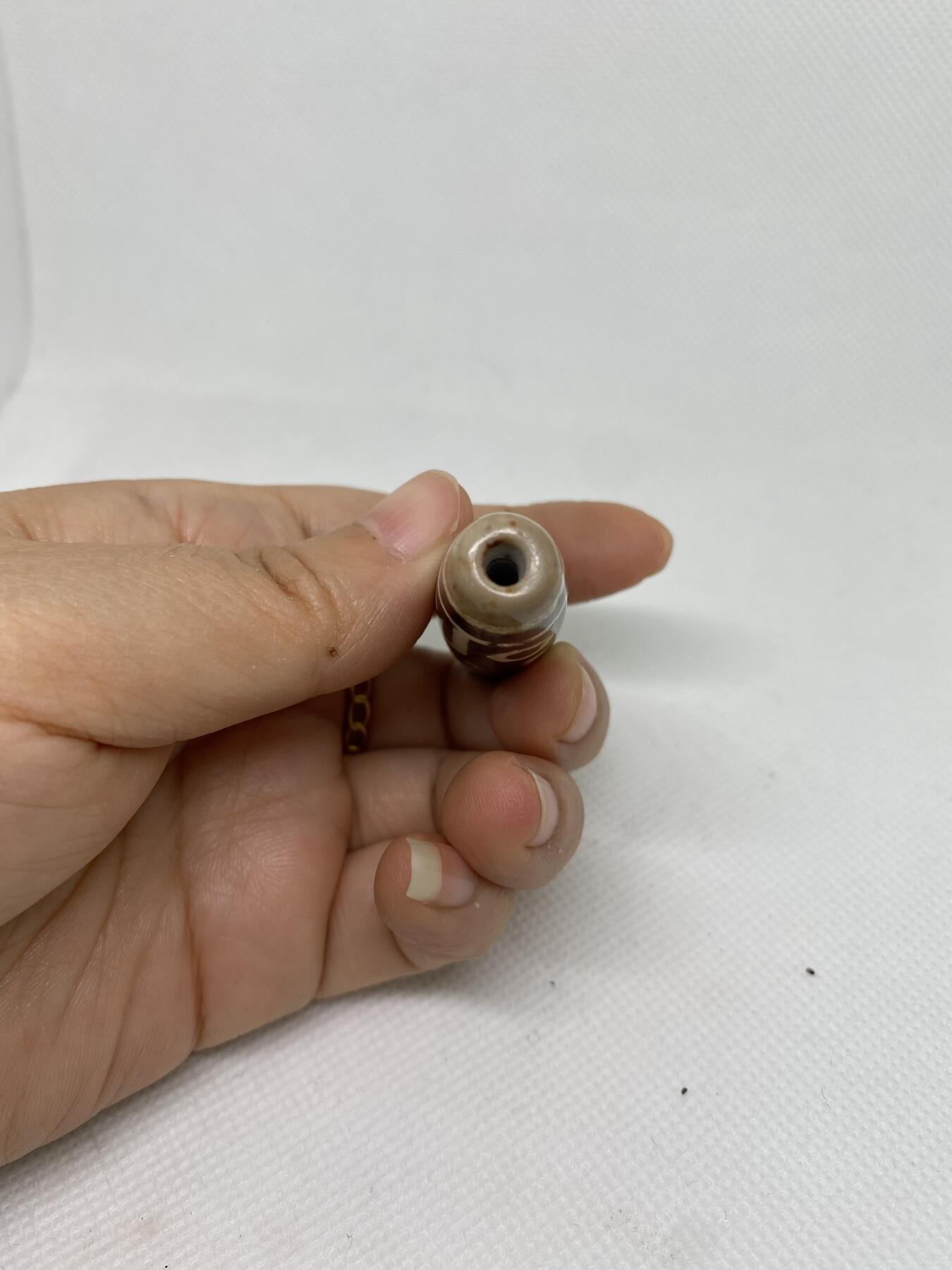 九眼天珠，尺寸5.7*1.4厘米，品相如图，680包快递