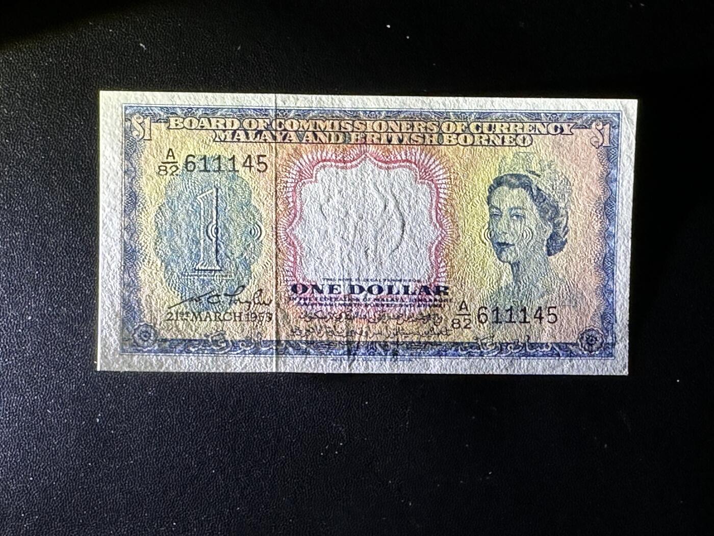 《外钞收藏家》第四百四十六期 1953年英属马来西亚和婆罗洲1元 AU品相 尾145