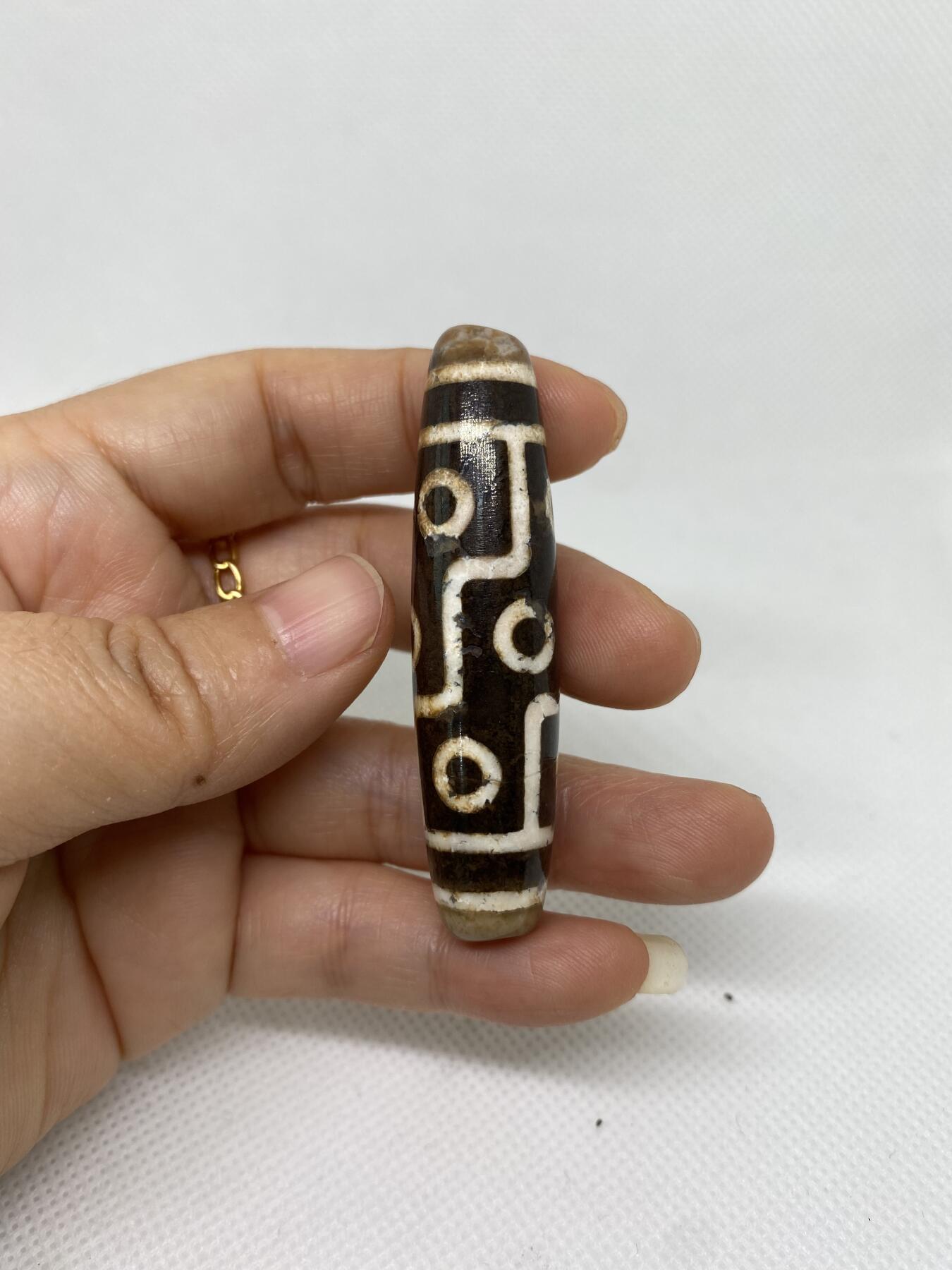 九眼天珠，尺寸5.7*1.4厘米，品相如图，680包快递