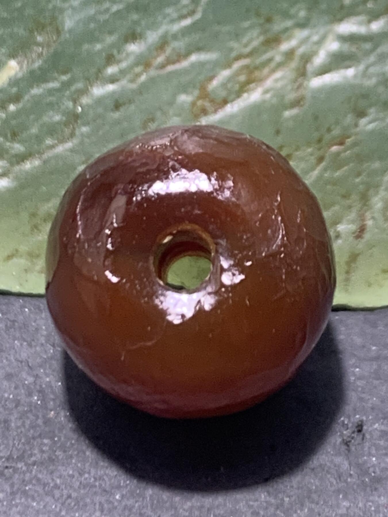 精美高玉化风化纹酒红玛瑙老形桶珠一颗