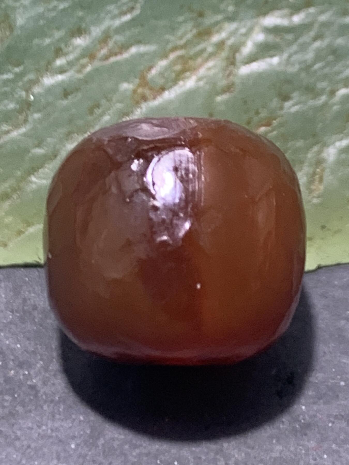 精美高玉化风化纹酒红玛瑙老形桶珠一颗