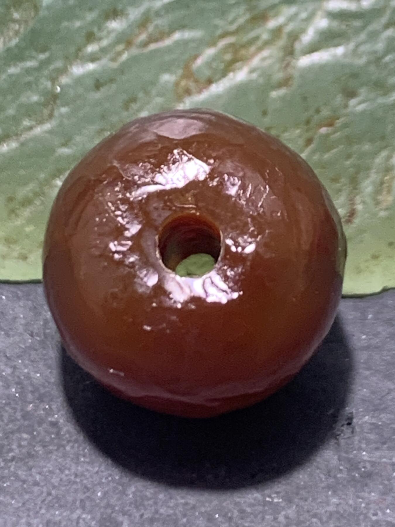 精美高玉化风化纹酒红玛瑙老形桶珠一颗