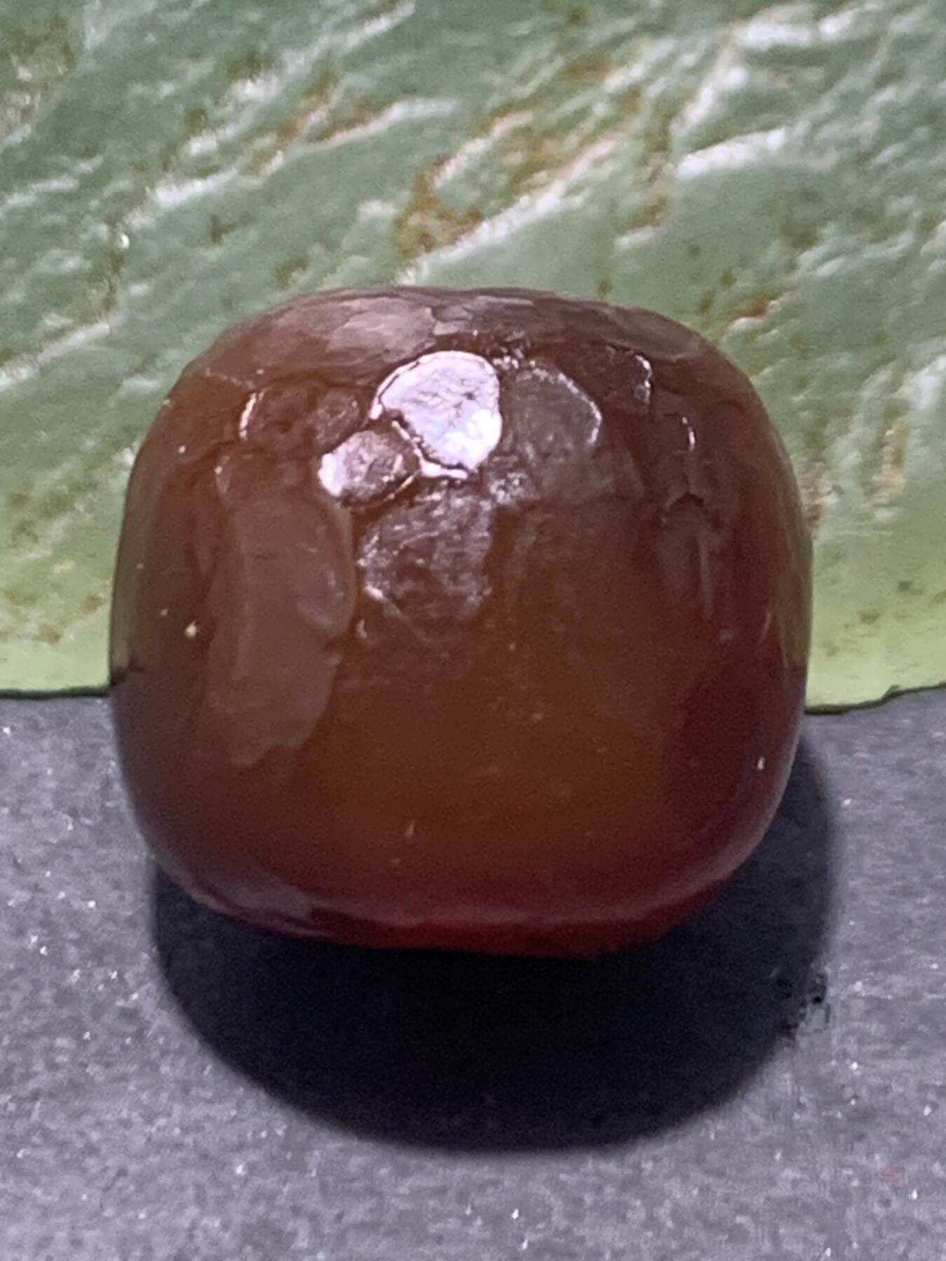 精美高玉化风化纹酒红玛瑙老形桶珠一颗