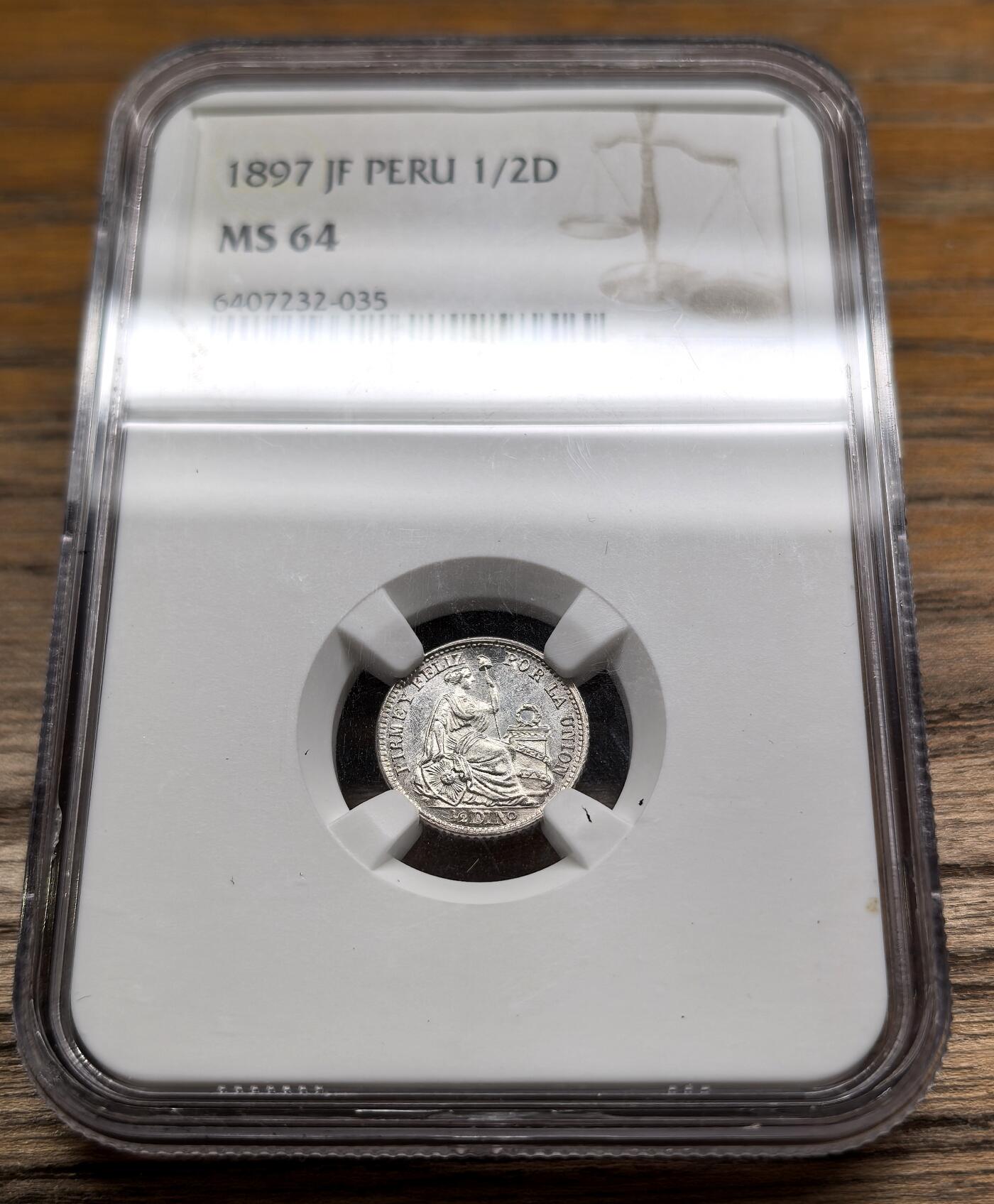 凡希社世界钱币微拍第二百九十二期 1897秘鲁1/2D银辅币NGC-MS64