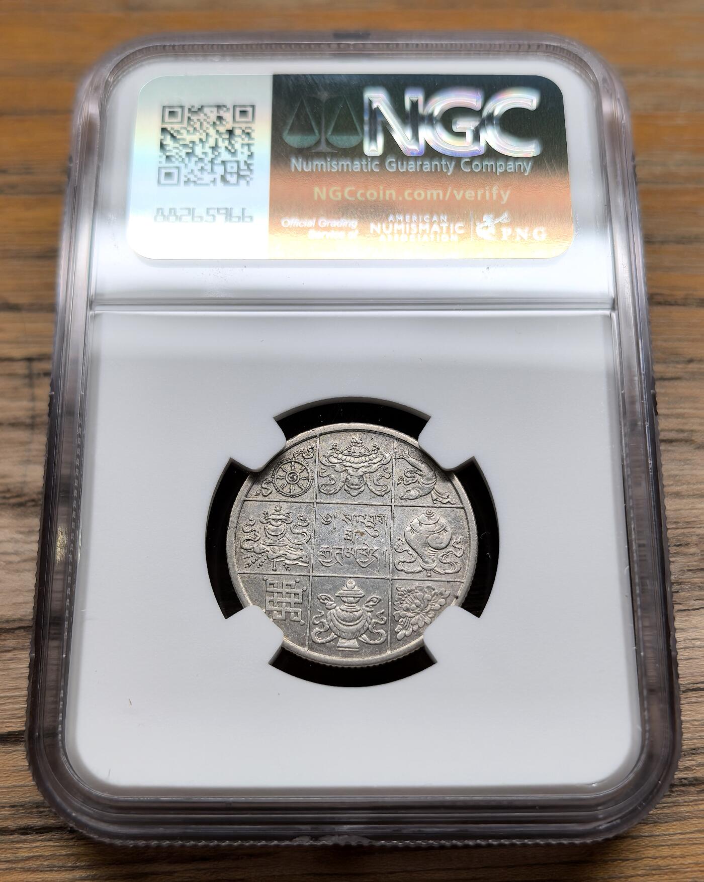 凡希社世界钱币微拍第二百九十二期 1928不丹王国八宝图1/2卢布银币NGC-AU55，铸造于英印加尔各答造币厂，铸量50000，藏传佛教帕竹噶举派之分支。