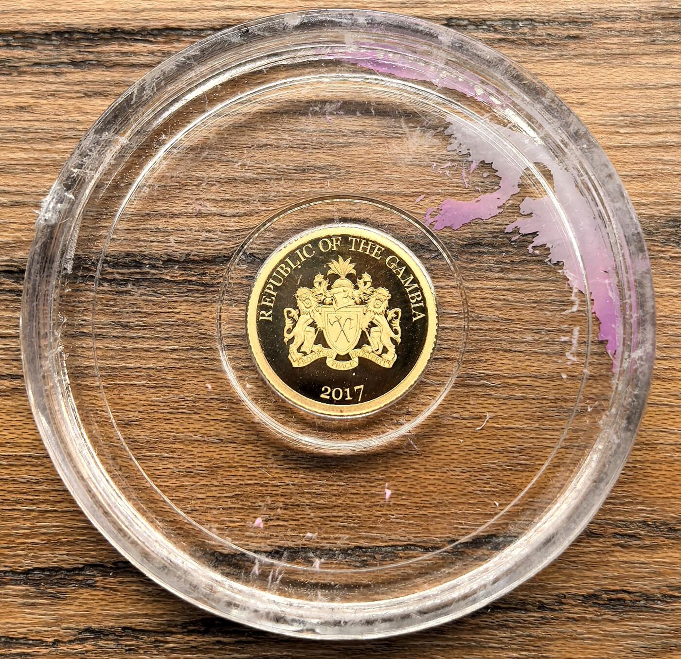 凡希社世界钱币微拍第二百九十二期 2017冈比亚动物200D金币UNC，0.5g，999金。