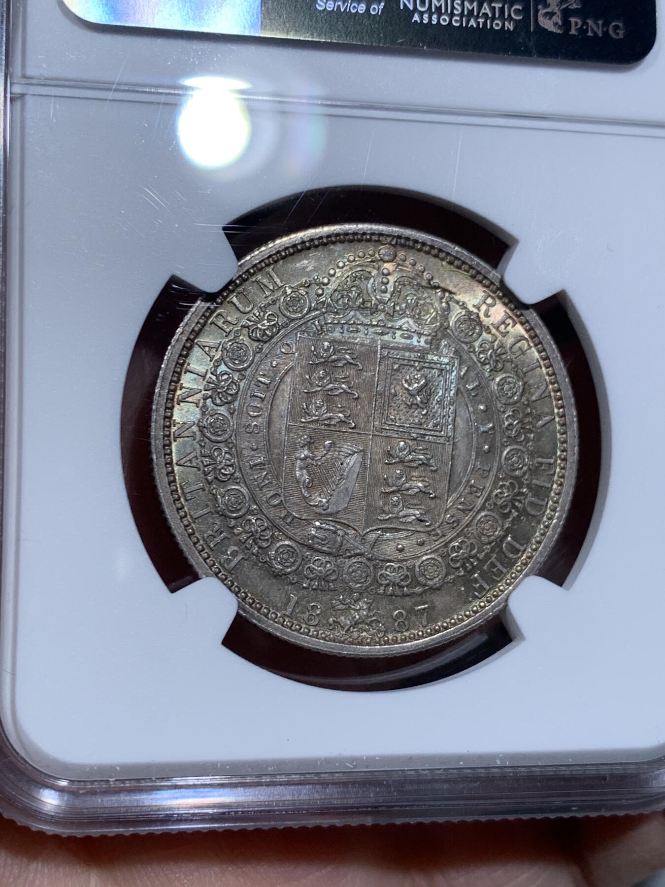 《竞宝斋》第334场 周日，周一 2场连拍 （全场包邮） NGC MS63 英国1887年维多利亚高冠半克朗银币 币面丝滑，车轮转光，淡五彩包浆