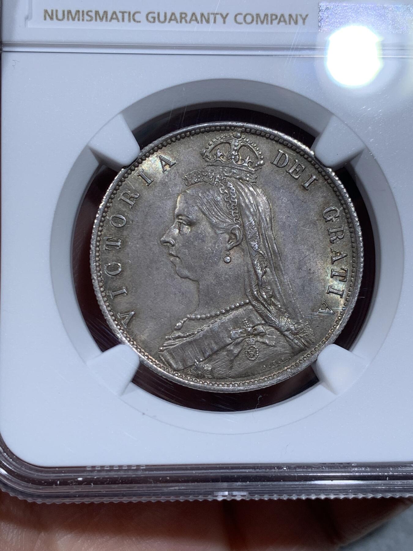 《竞宝斋》第334场 周日，周一 2场连拍 （全场包邮） NGC MS63 英国1887年维多利亚高冠半克朗银币 币面丝滑，车轮转光，淡五彩包浆