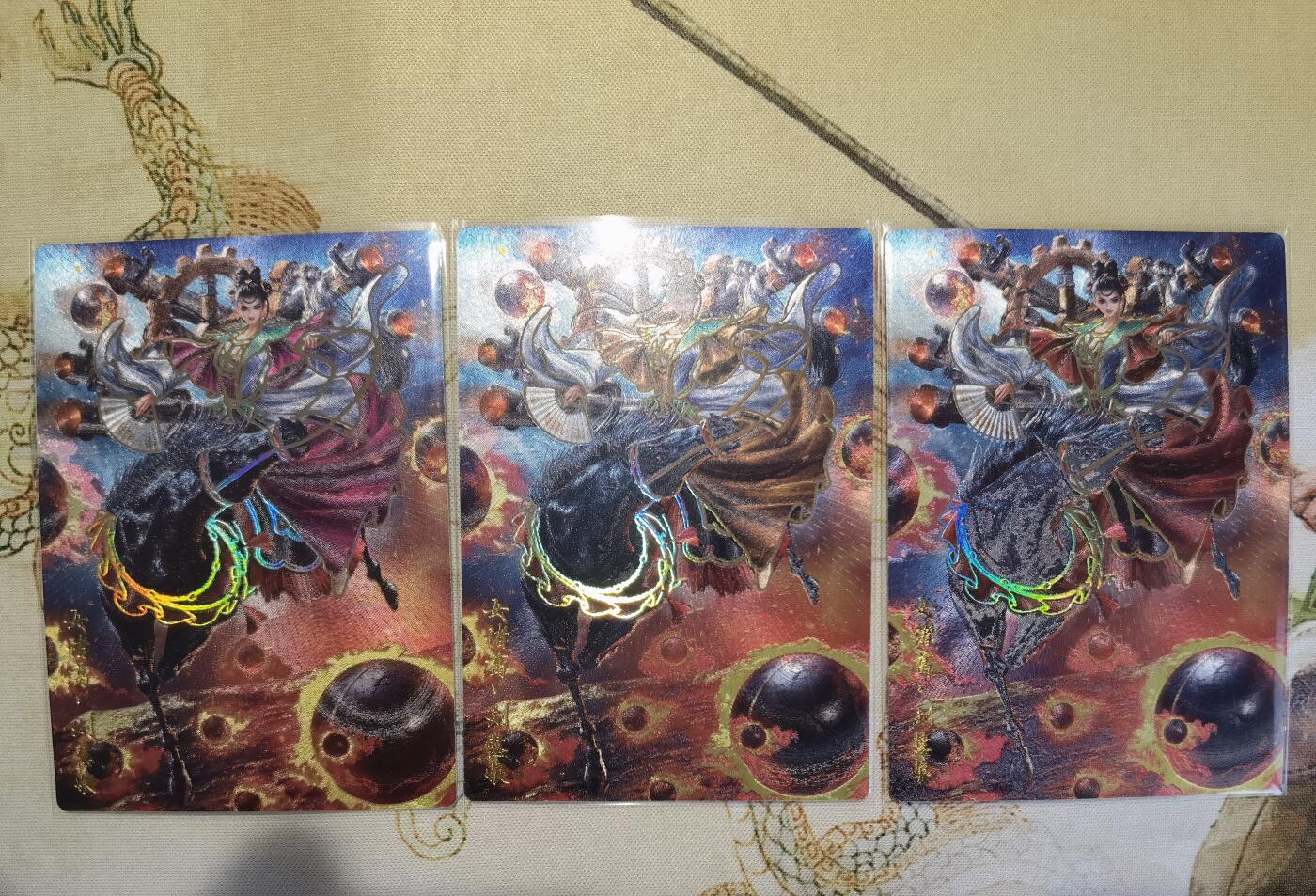 奇趣收藏卡牌拍卖第5场（全场包邮 收拍品免费上拍） 卡德曼巾帼水浒烫金+冷烫粗闪，刘慧娘1组X3色共3张，63*88mm