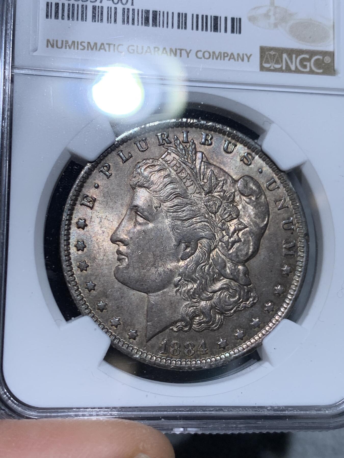 《竞宝斋》第334场 周日，周一 2场连拍 （全场包邮） NGC MS63 美国1884年O版摩根1美圆银币