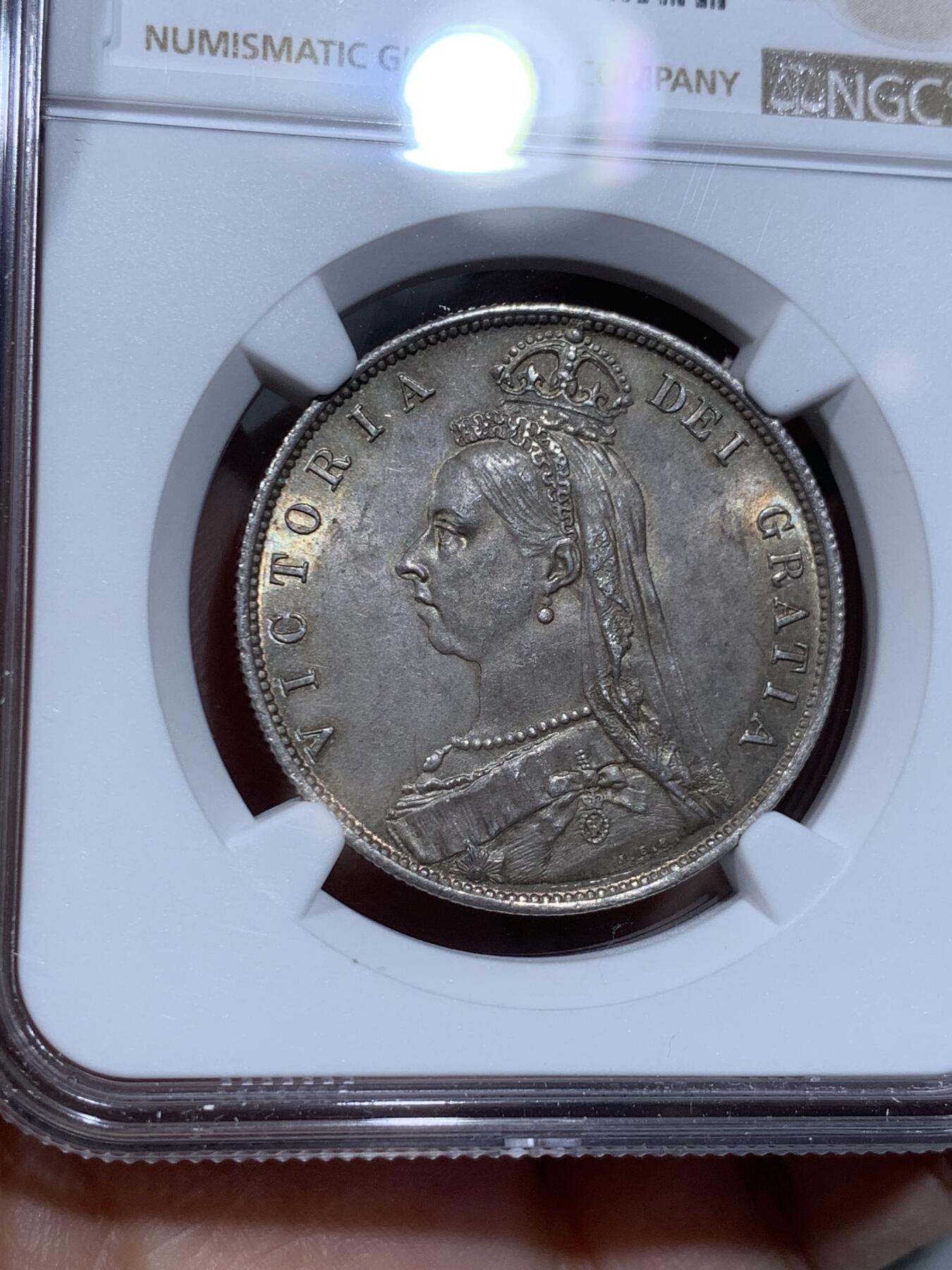 《竞宝斋》第334场 周日，周一 2场连拍 （全场包邮） NGC MS63 英国1887年维多利亚高冠半克朗银币 币面丝滑，车轮转光，淡五彩包浆