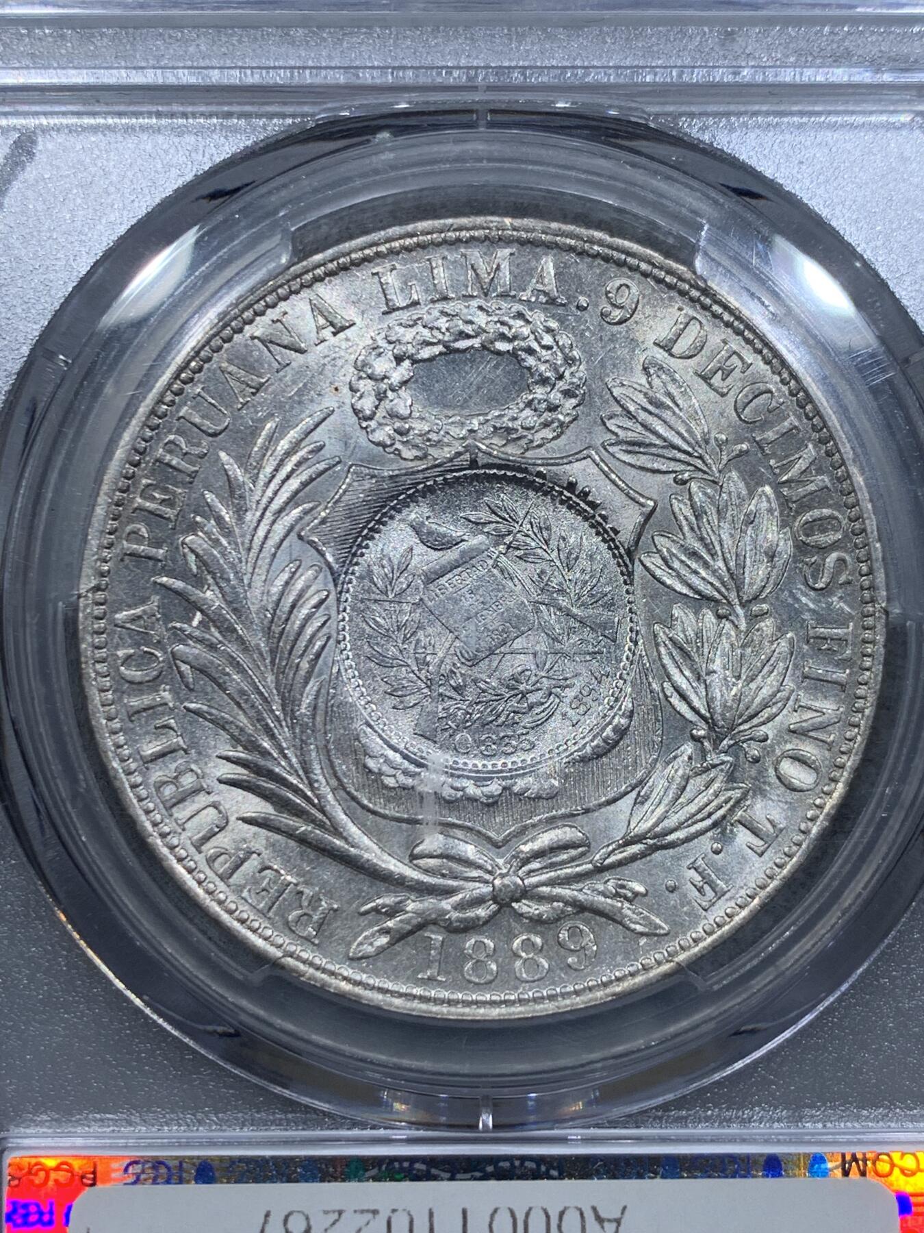 《竞宝斋》第334场 周日，周一 2场连拍 （全场包邮） PCGS AU58 危地马拉1894年加盖1比索大银币，外拍热点品种。币胚1889年。银光流畅丝滑，低评好状态。戳记打制清晰周正，在此品种里很有难度