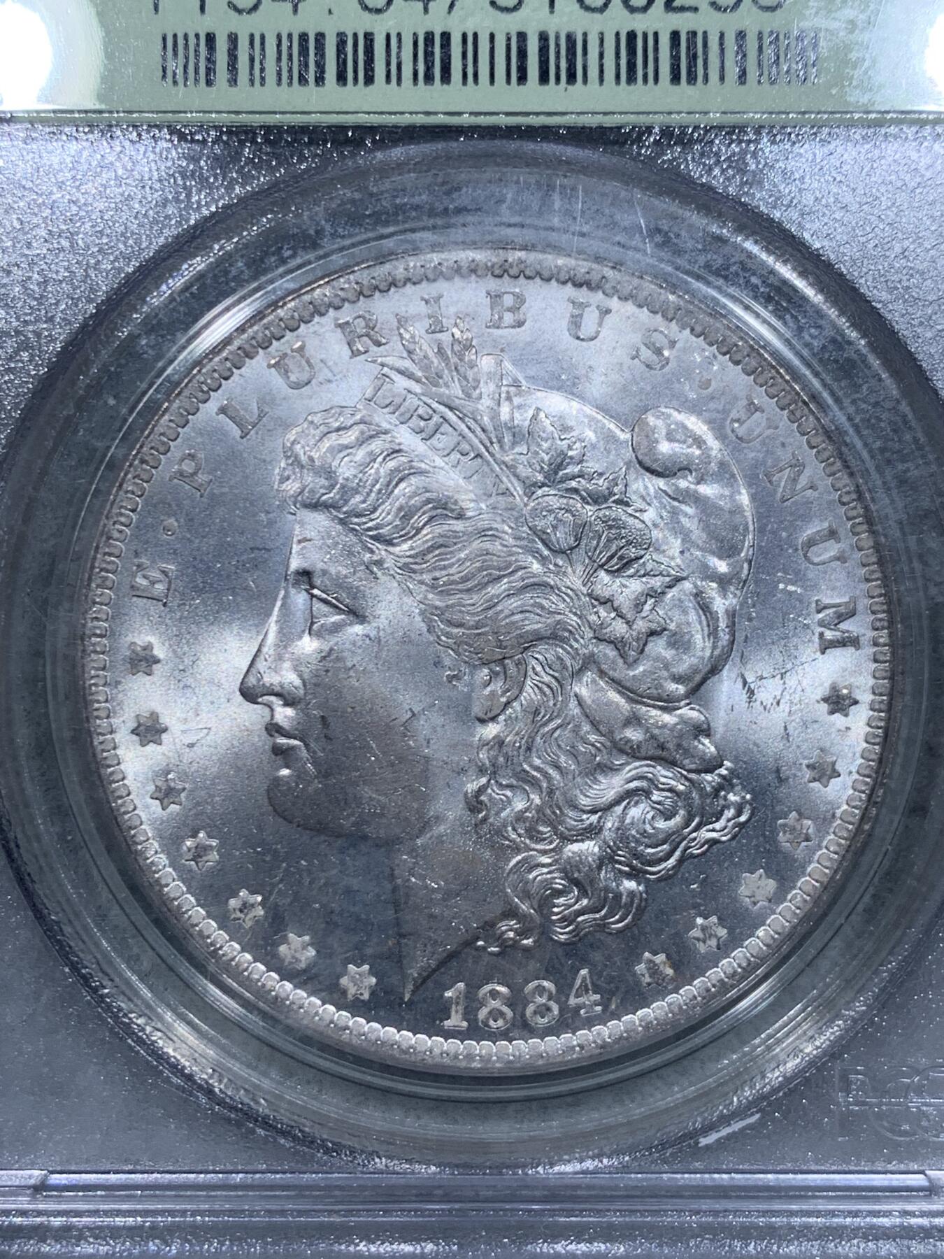 《竞宝斋》第334场 周日，周一 2场连拍 （全场包邮） PCGS MS64 美国1884年O版摩根银币，老盒好品