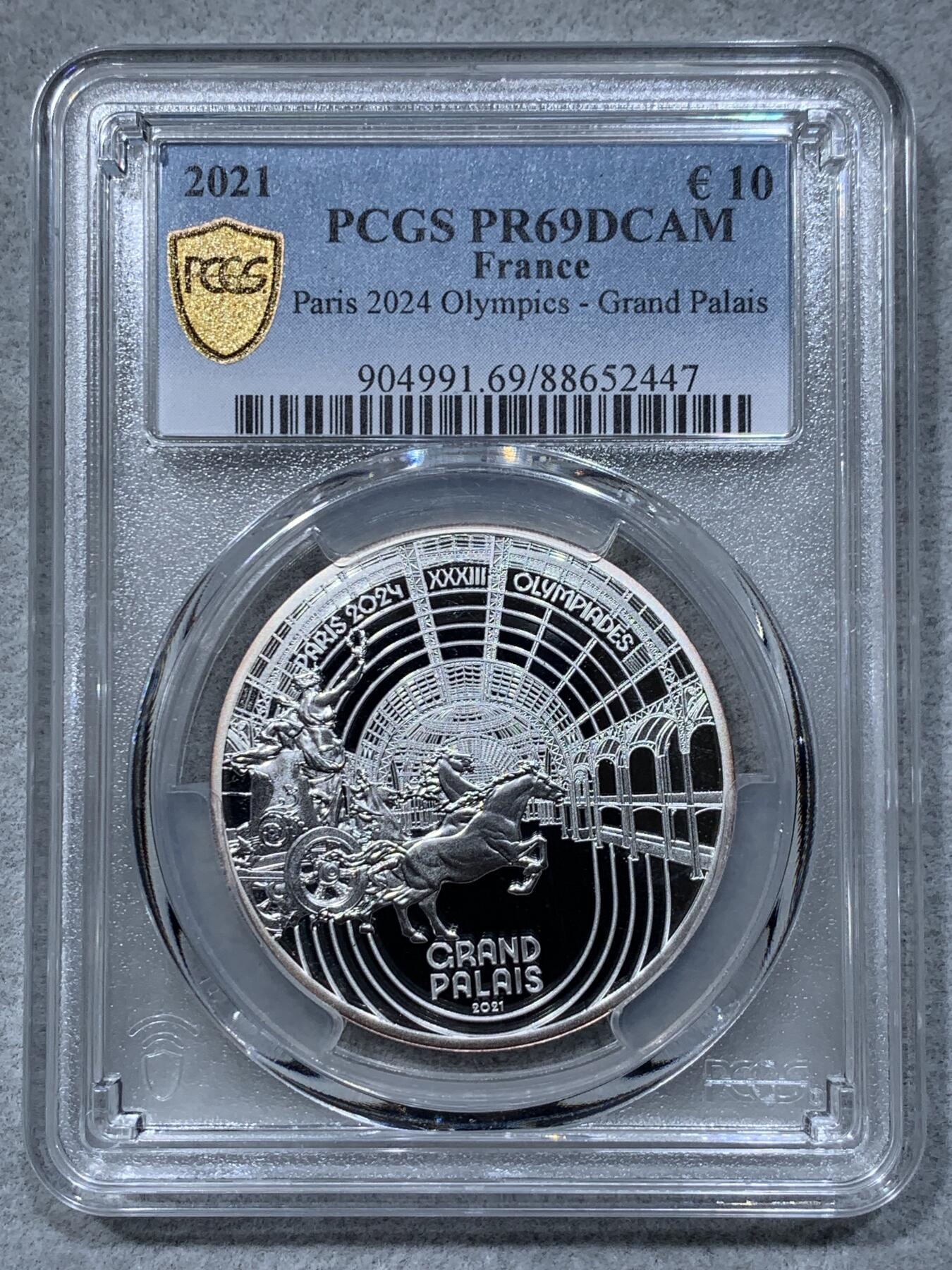 《竞宝斋》第334场 周日，周一 2场连拍 （全场包邮） PCGS PR69DCAM 法国2021年巴黎奥运会历史遗产系列-巴黎大皇宫10欧元精制纪念币（个人认为奥运会纪念币中最美丽的一枚，克重22.2克，999纯银，限量7500枚，盒证齐全）