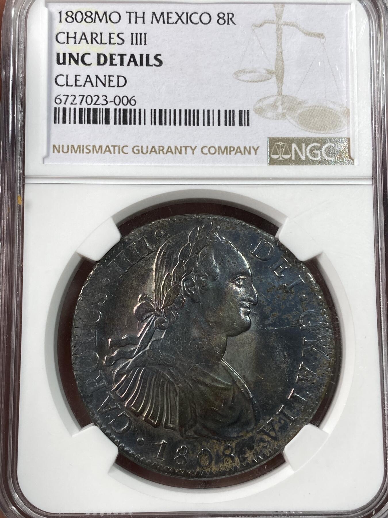 万国钱币拍卖第038期 NGC UNCD 1808MO TH西属墨西哥卡洛斯四世双柱8里亚尔 原味五彩 双柱面PL质感打制极佳
