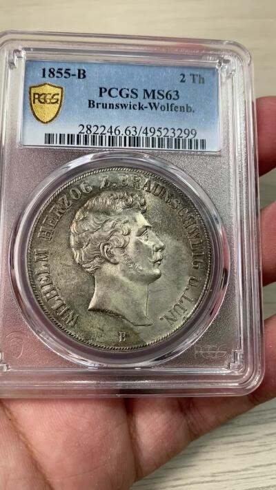 万国钱币拍卖第038期 PCGS MS63 1855年德国布伦瑞克-狼堡大窗帘流通2泰勒 清幽淡五彩 机铸痕清晰可见  全深打邮票光泽 流通2泰勒到63已是不易 顶级收藏品质