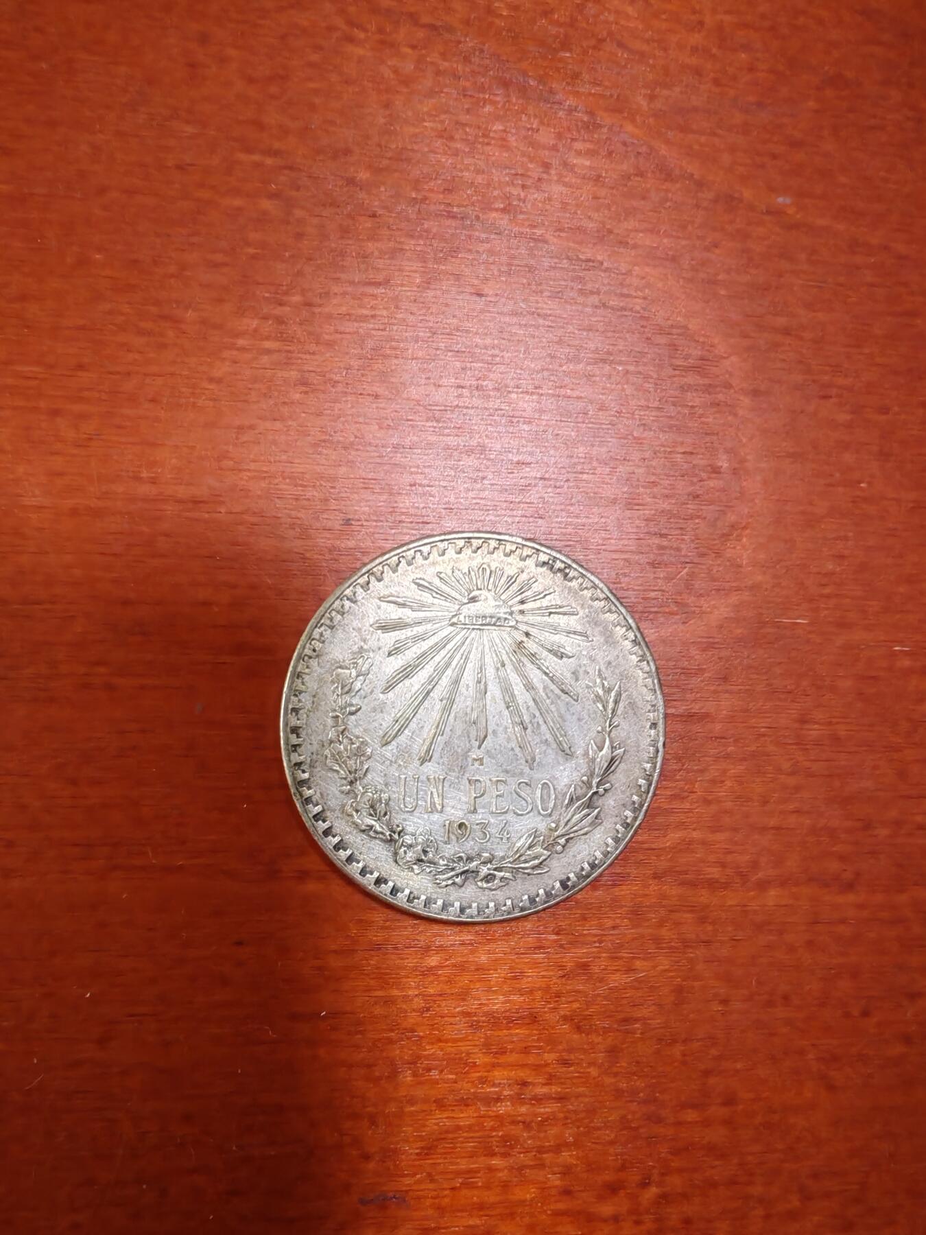 长老汇龙年精选第三十三场拍卖 1934墨西哥1比索鹰洋，好品，高点都在