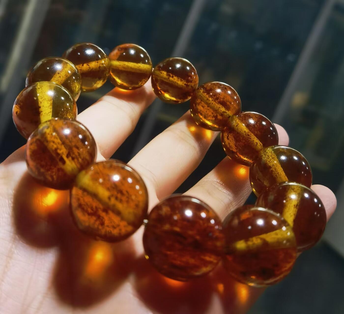 天然琥珀佛珠手串男款内部可见天然火山灰等，全品 尺寸:1.8cm克重:47.9