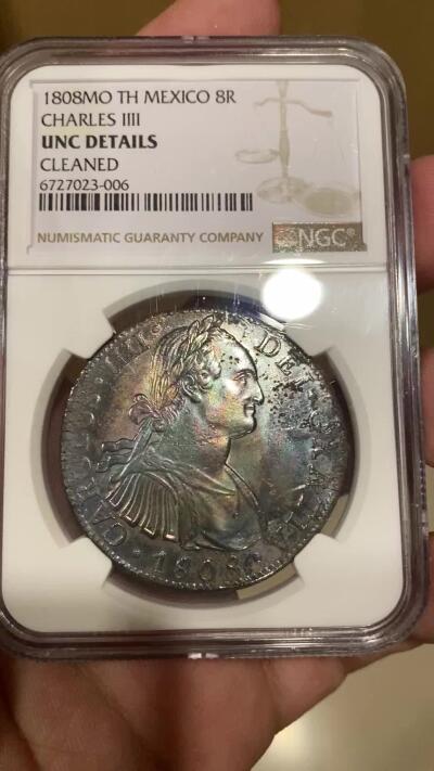 万国钱币拍卖第038期 NGC UNCD 1808MO TH西属墨西哥卡洛斯四世双柱8里亚尔 原味五彩 双柱面PL质感打制极佳