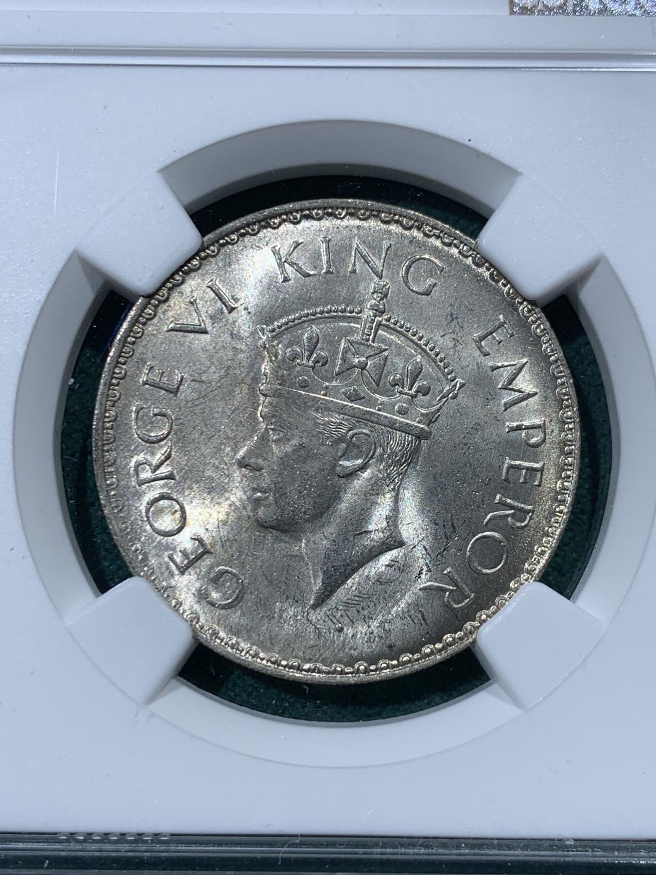 《竞宝斋》第335场 周日，周一 2场连拍 （全场包邮） NGC MS64 冠军分 英属印度1941年1卢比银币B版 乔治六世 原光卷拆转光品相 这个品种上64很难 冠军分值得收藏