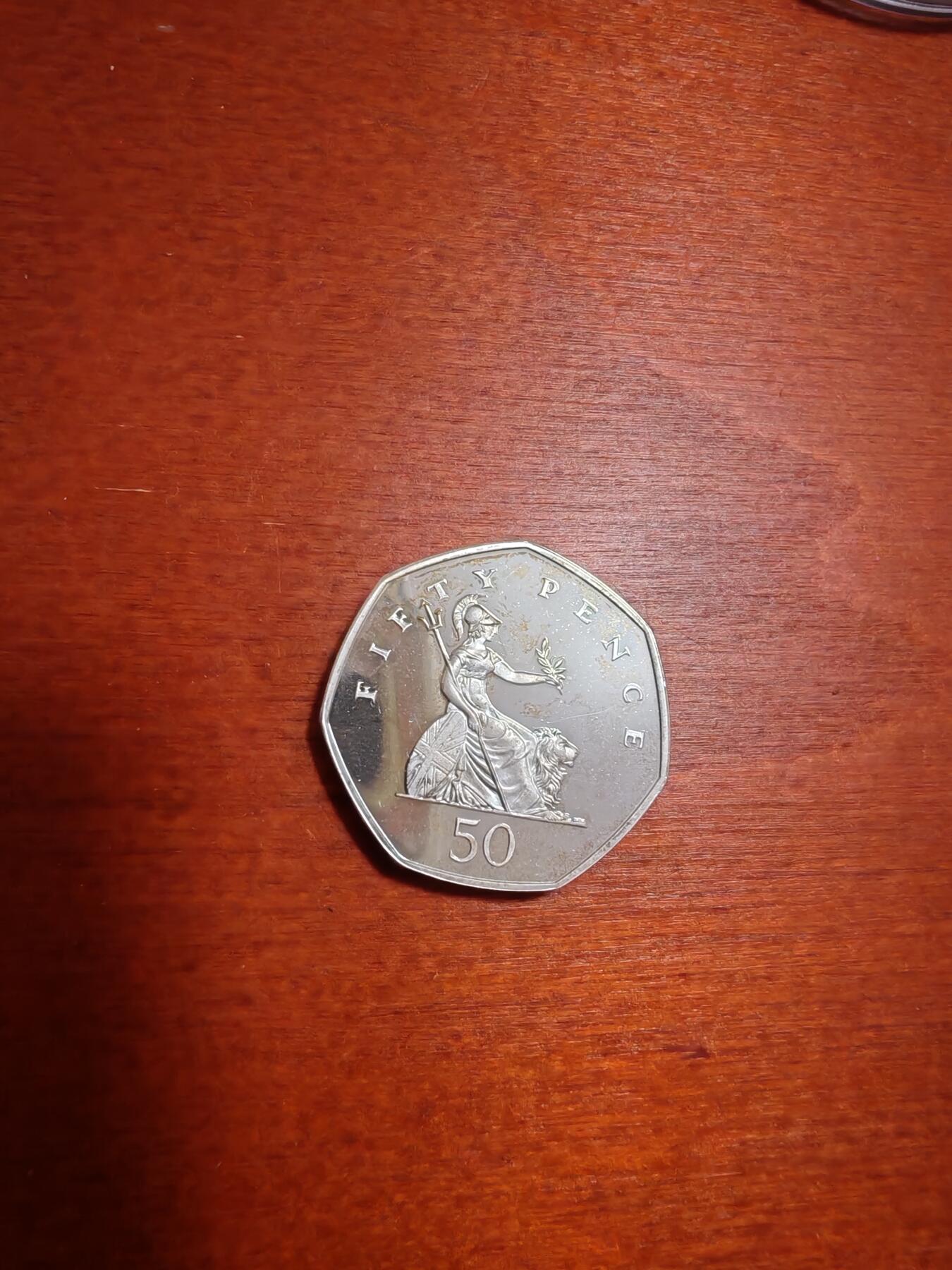 长老汇龙年精选第三十五场拍卖 1997英国50便士七边形精制加厚银币
