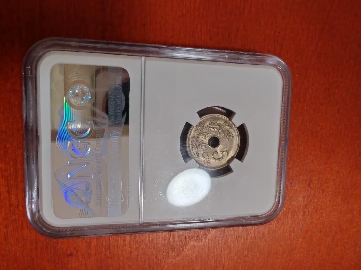 长老汇龙年精选第三十五场拍卖  1902 比利时5分中孔铜镍币，NGC MS64分，法语版，季军分，更高分仅有3枚