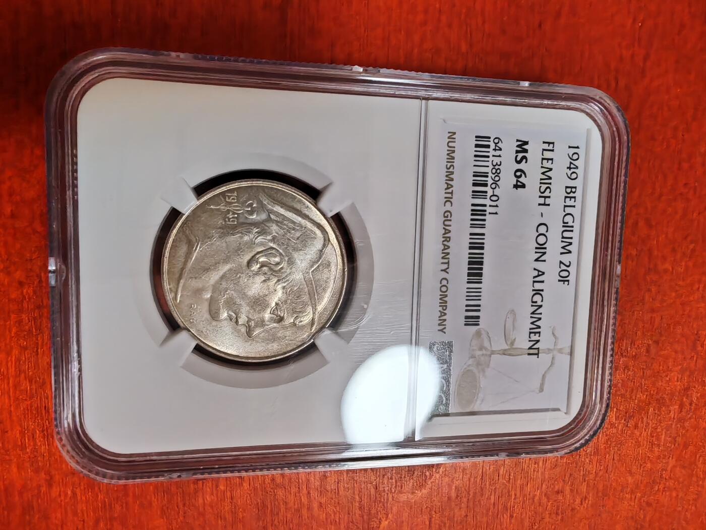 长老汇龙年精选第三十五场拍卖 1949 比利时商业神20法郎银币，NGC MS64分，弗莱芒语，唯一冠军分