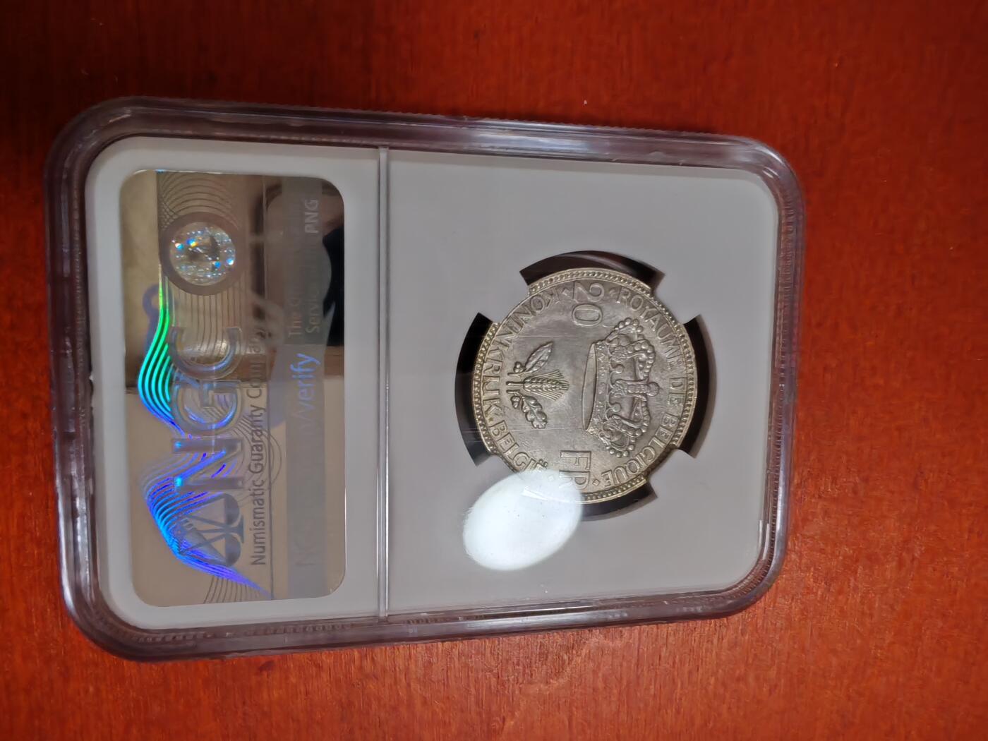 长老汇龙年精选第三十五场拍卖 1935 比利时20法郎银币，NGC MS65分，POSITION B，唯一亚军分，更高分仅有1枚