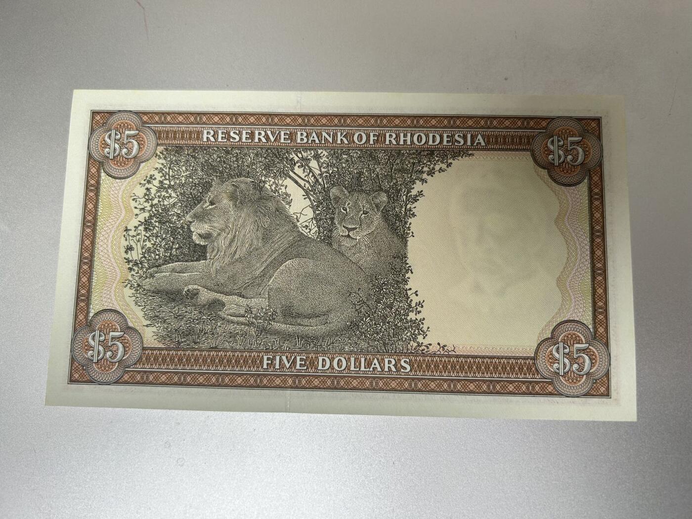 收藏联盟Quantum Auction 第399期拍卖 @征集拍品 长期供货可享分佣福利 1978年罗得西亚5元 UNC-有荧光斑