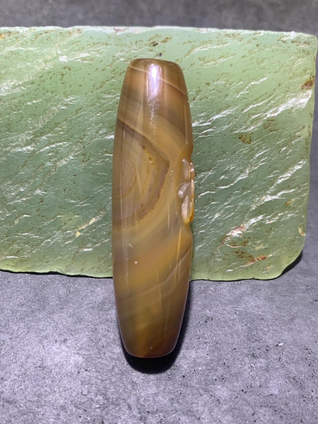 精美亚光高玉化天眼纹巴西玛瑙手工俏色巧雕诺字随形桶珠一个！