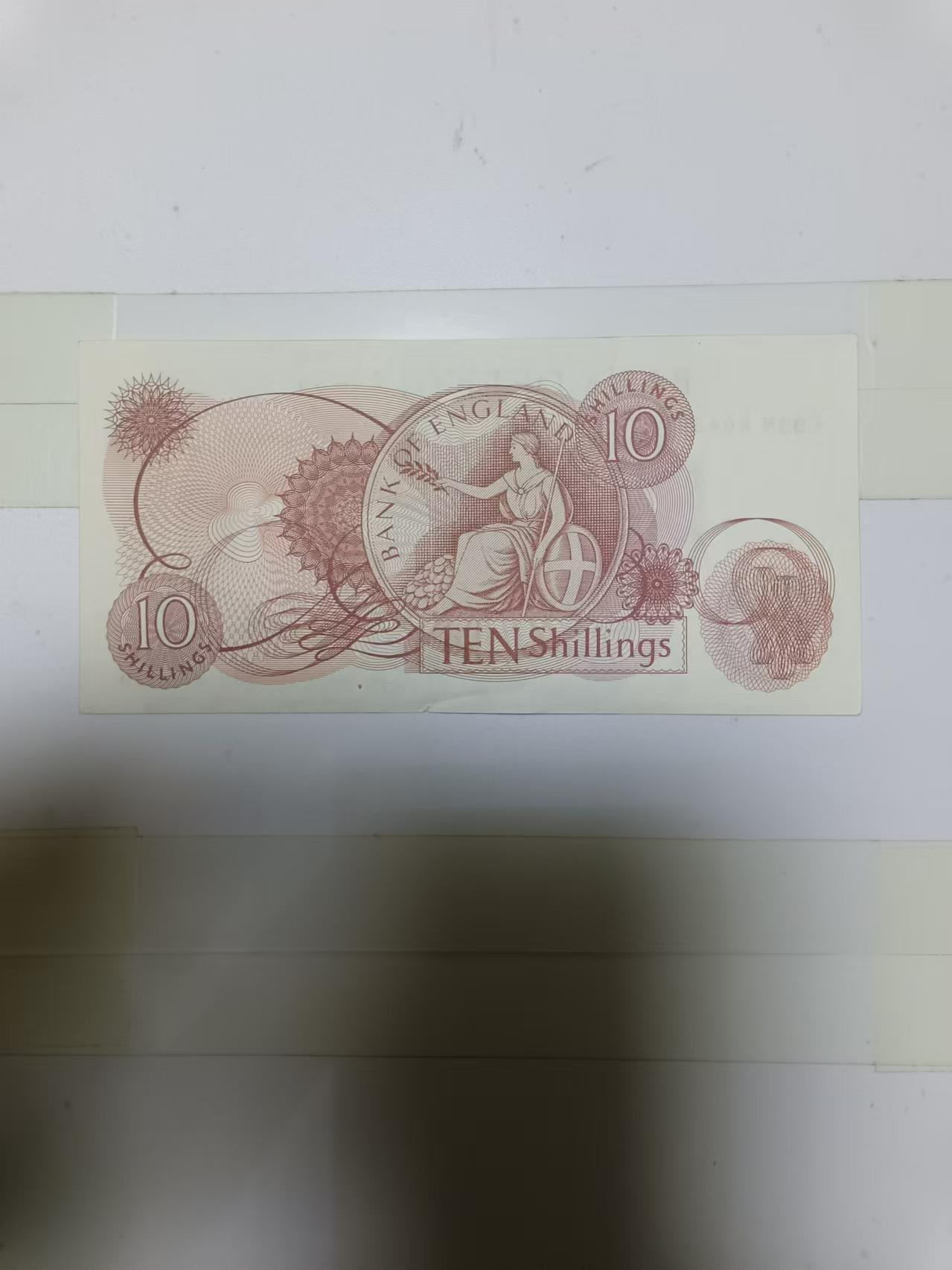 【20241213】非全新纸币第200场 英国C序列10先令，有微裂