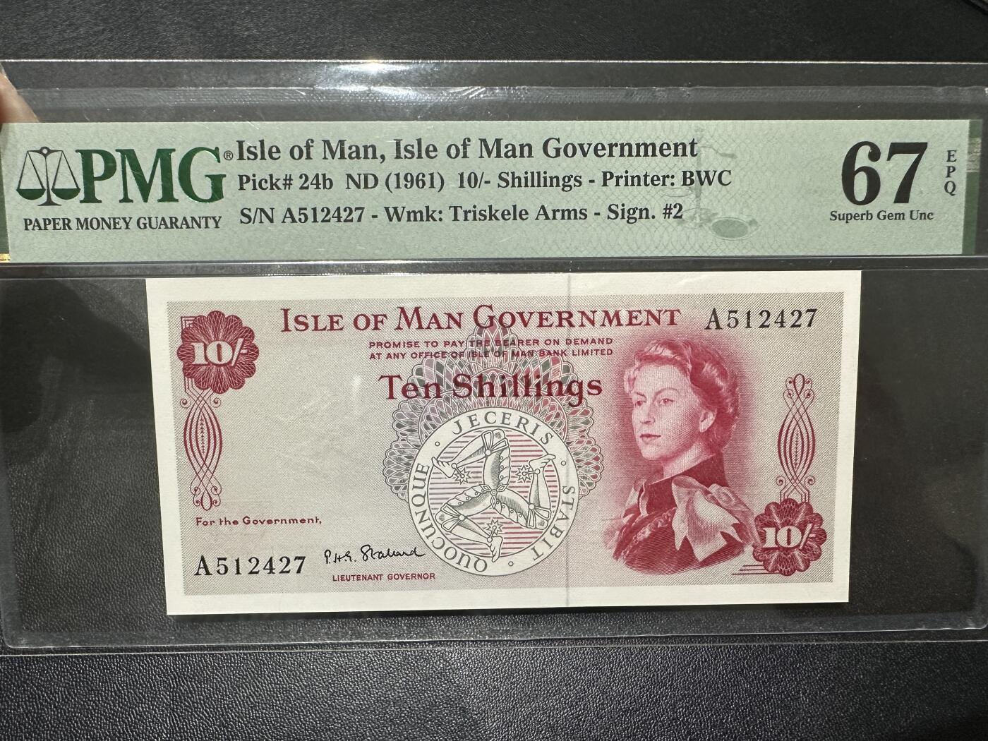 《外钞收藏家》第四百五十三期 1961年阿曼群岛10先令 PMG67 BWC作品