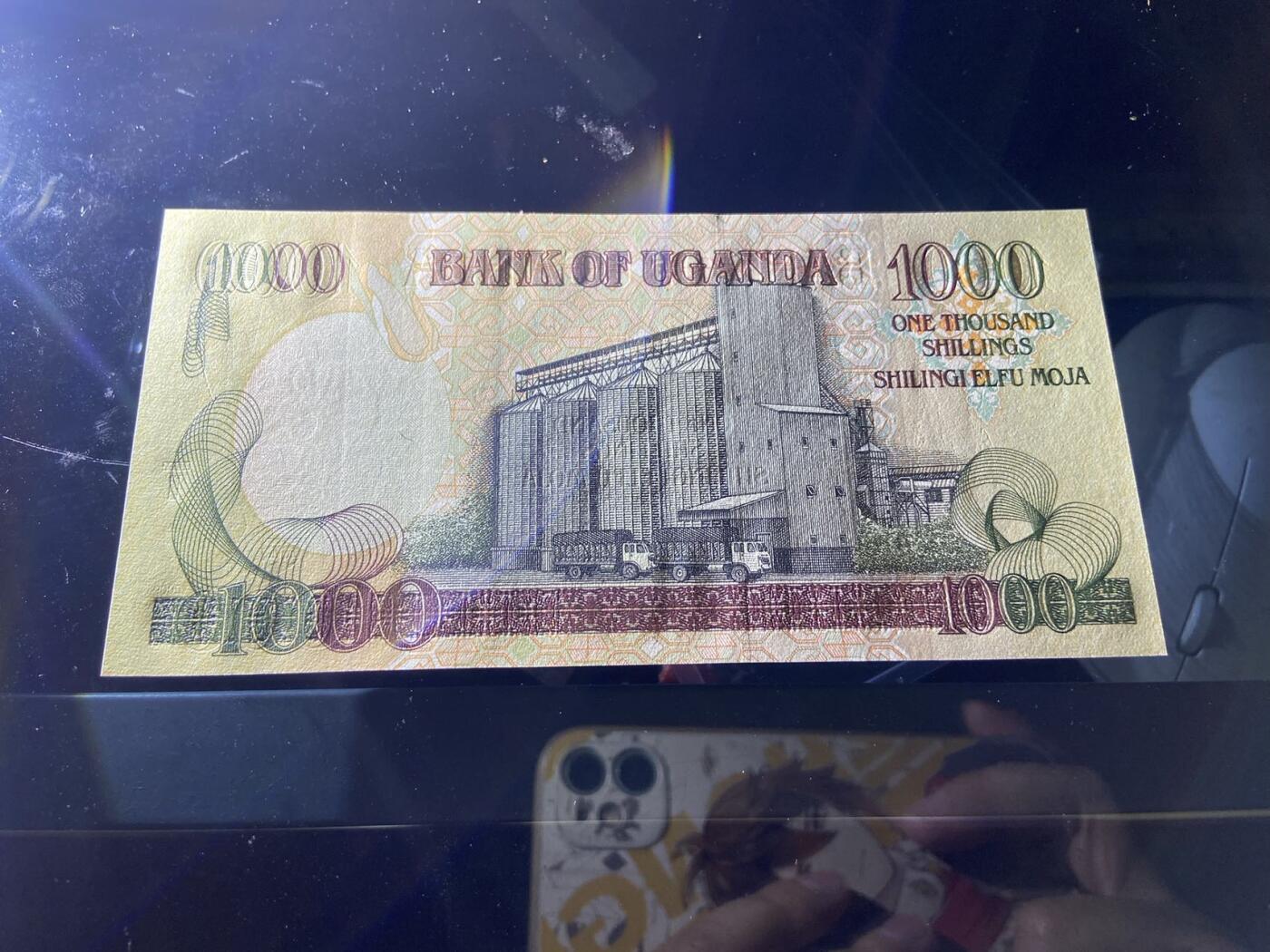 【炜奕收藏】，第二十期，裸钞专场 乌干达1000先令，UNC-品相