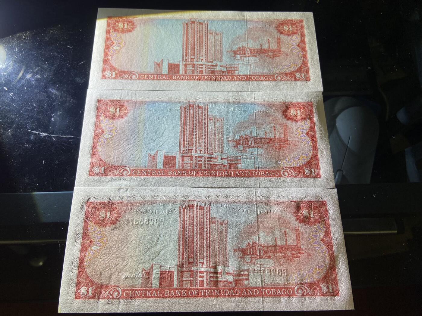 【炜奕收藏】，第二十期，裸钞专场 特立尼达和多巴哥85年版1元，三张不同签名，UNC品相