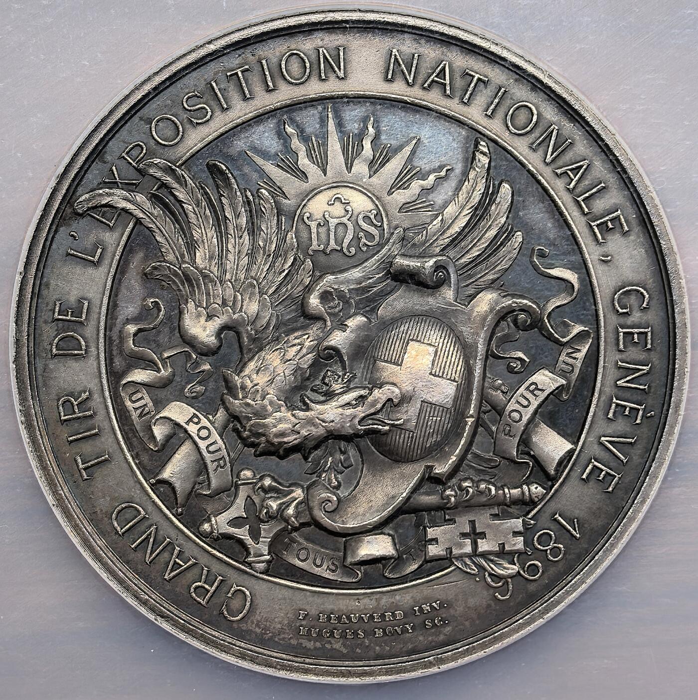 凡希社世界钱币微拍第二百九十三期 1896瑞士日内瓦射击节纪念大银章NGC-MS62，持弓的女武士，设计漂亮，幻彩紫罗兰！