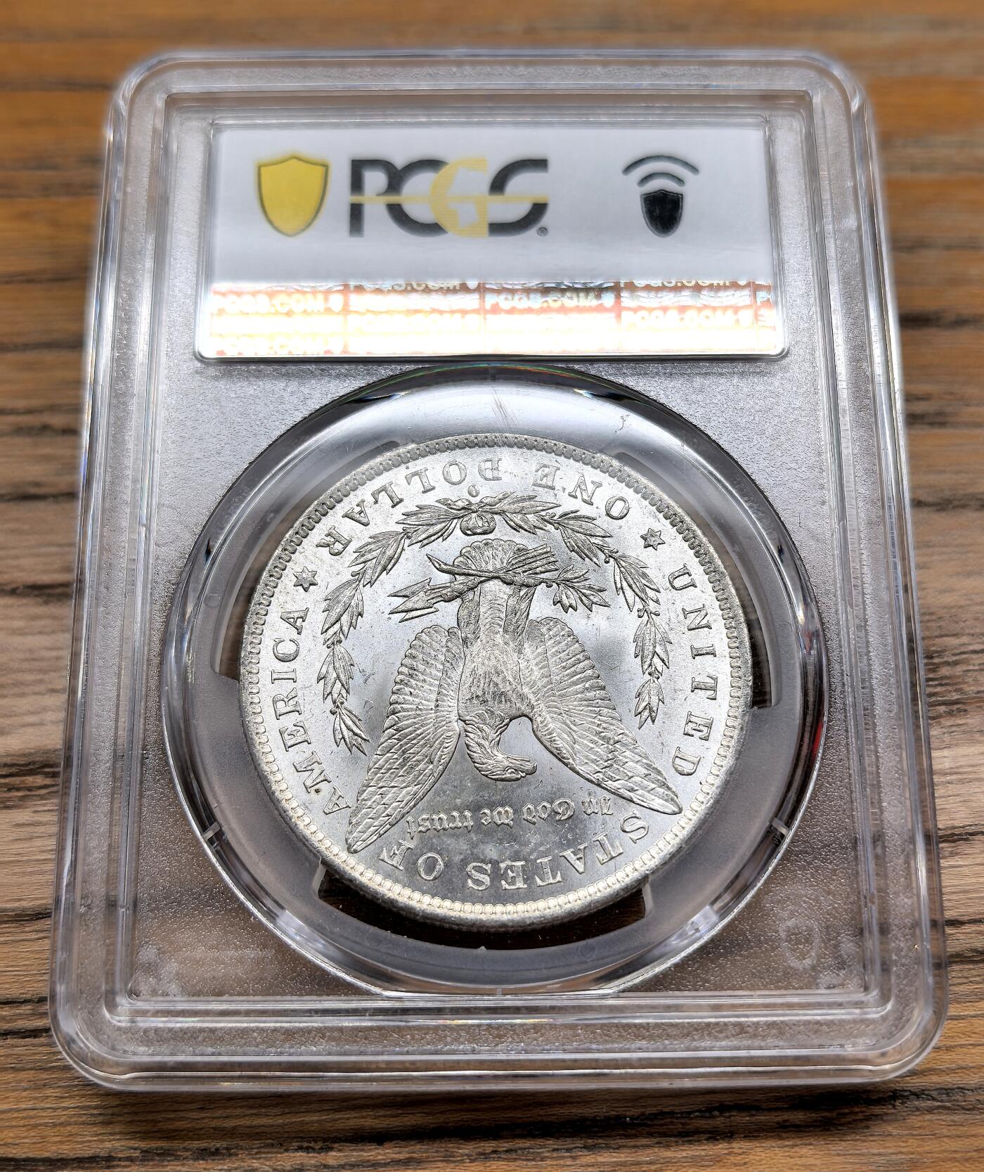 凡希社世界钱币微拍第二百九十三期 1884O美国摩根壹元PCGS-MS65，卷首币。