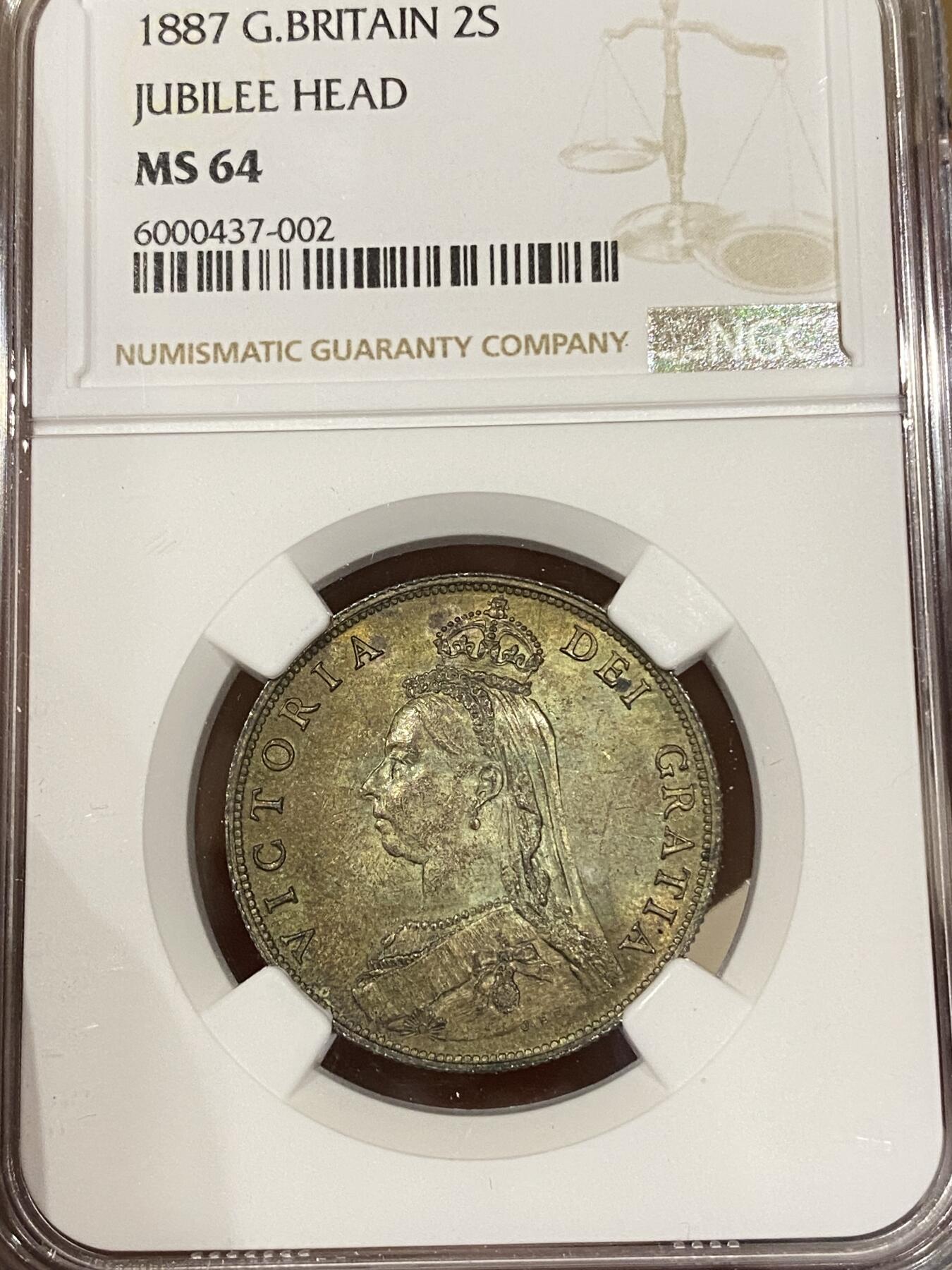 万国钱币拍卖第039期 NGC MS64 1887英国维多利亚女王高冠弗洛林 原味五彩。