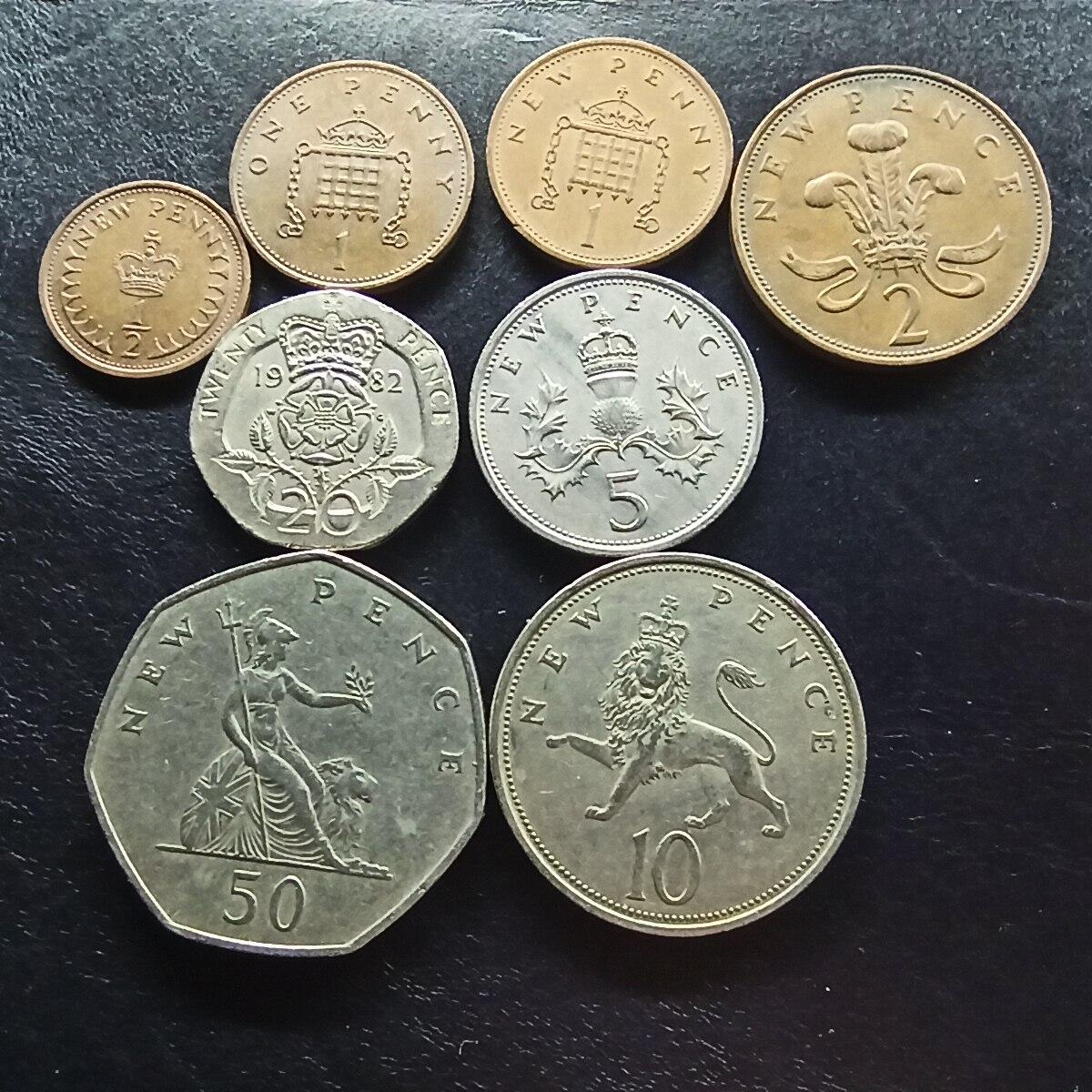 邮泉阁限时拍卖第十五场 各国硬币专场（拍卖结束后请付邮费，存留时间过长需全部邮寄） 英国伊丽莎白二世第二头像8枚