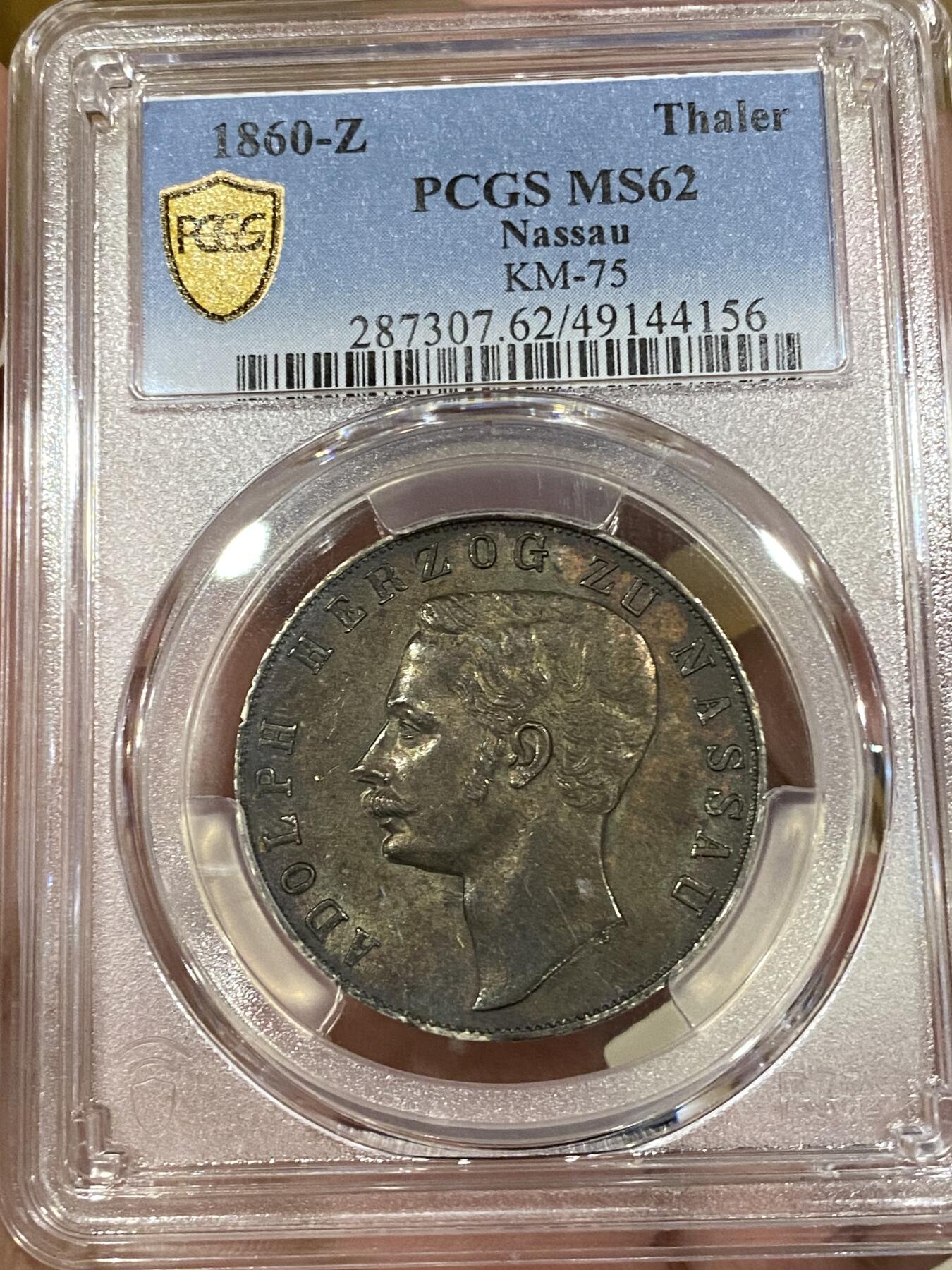万国钱币拍卖第039期 PCGS MS62 1860德国拿骚双狮纹章泰勒 深度五彩转光，难得状态。