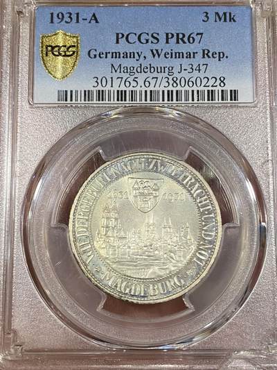 万国钱币拍卖第039期 - PCGS PR67 1931魏玛共和国精制马格德堡景观3马克 媲美现代币的工艺与分数，肉眼无暇状态。